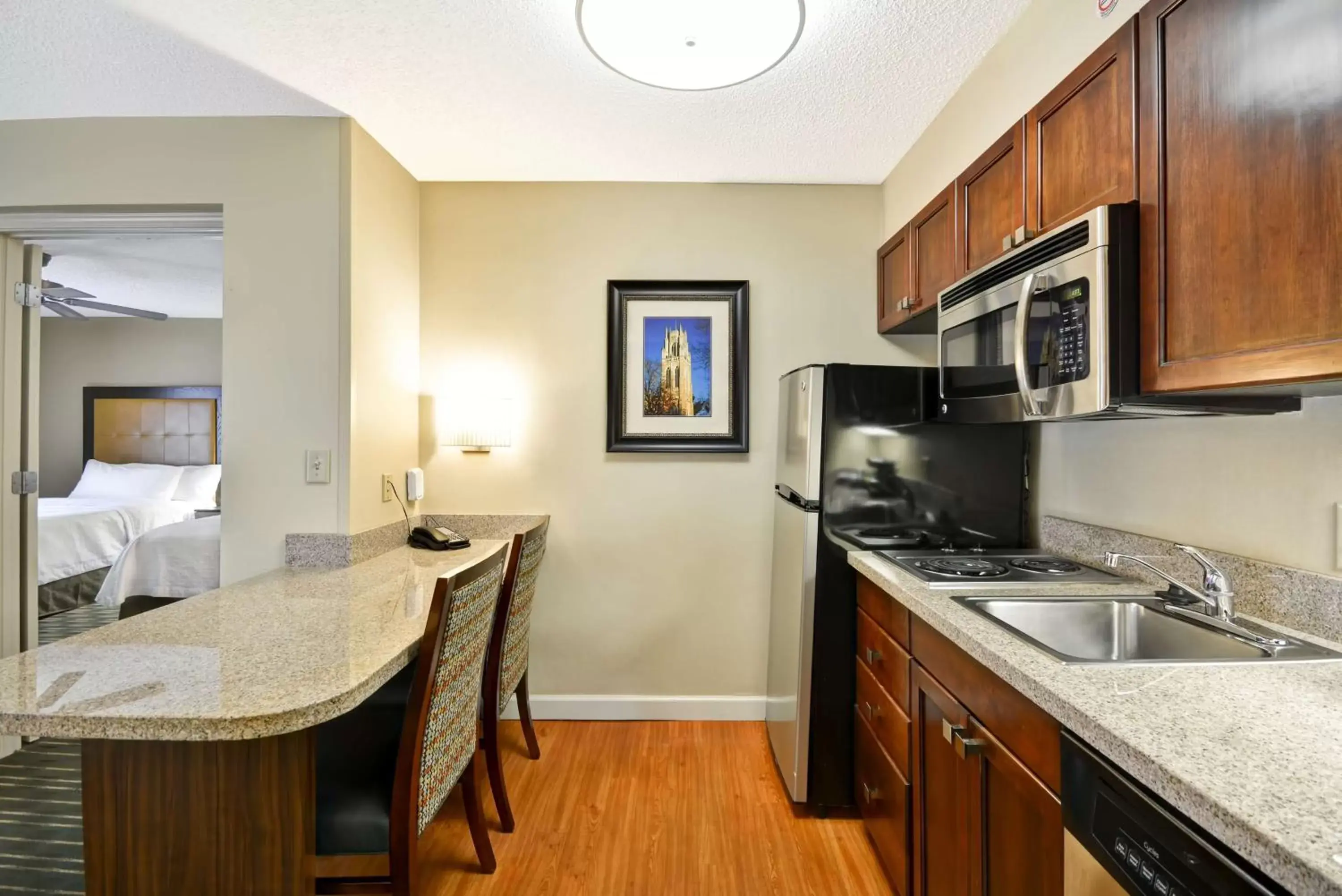 Bedroom, Kitchen/Kitchenette in Homewood Suites Durham-Chapel Hill I-40