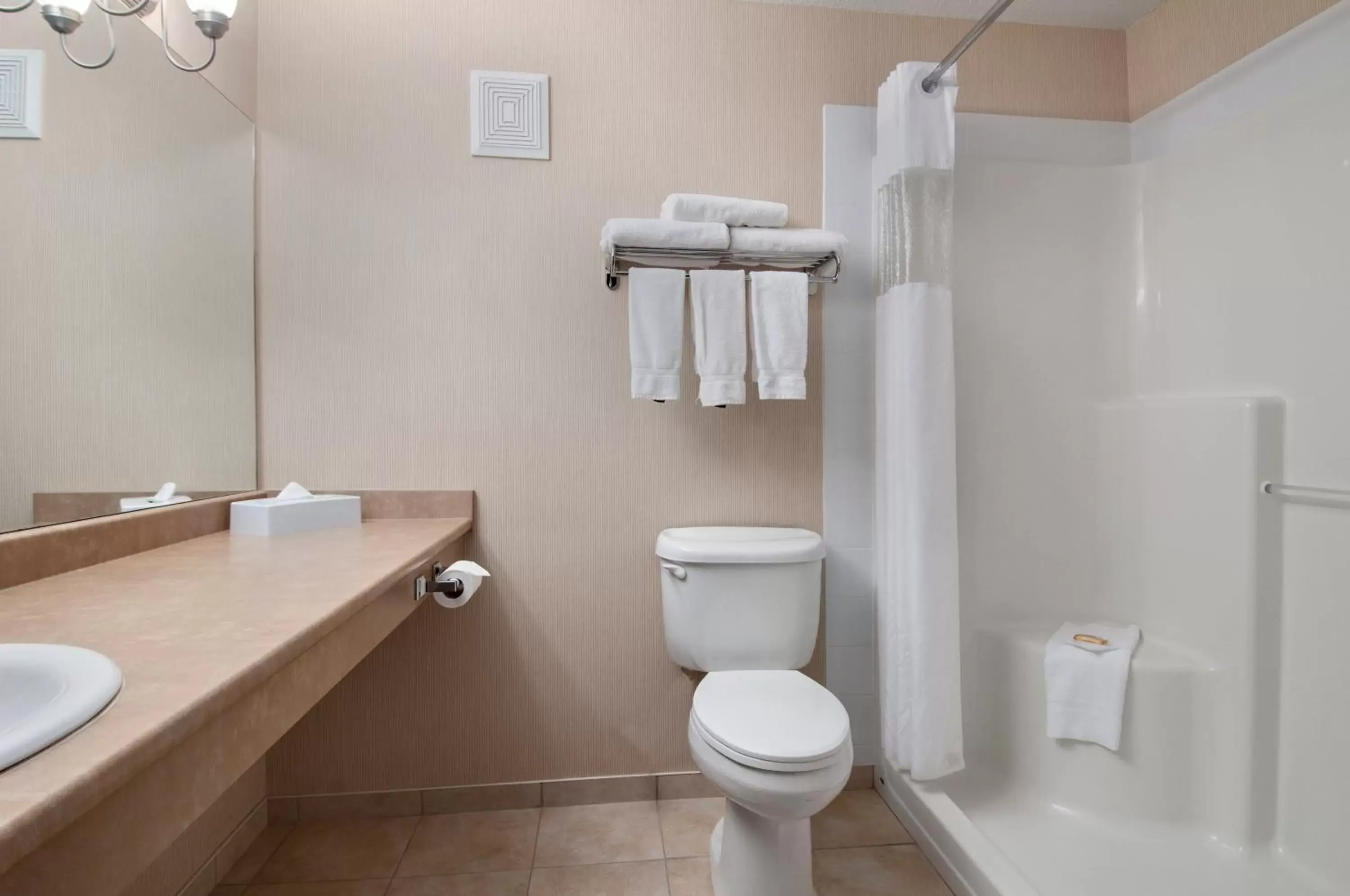Shower, Bathroom in Days Inn & Suites by Wyndham Cochrane
