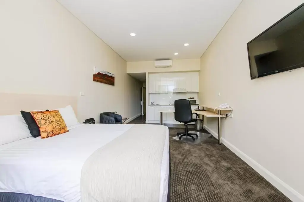 Photo of the whole room, TV/Entertainment Center in Belconnen Way Hotel & Serviced Apartments