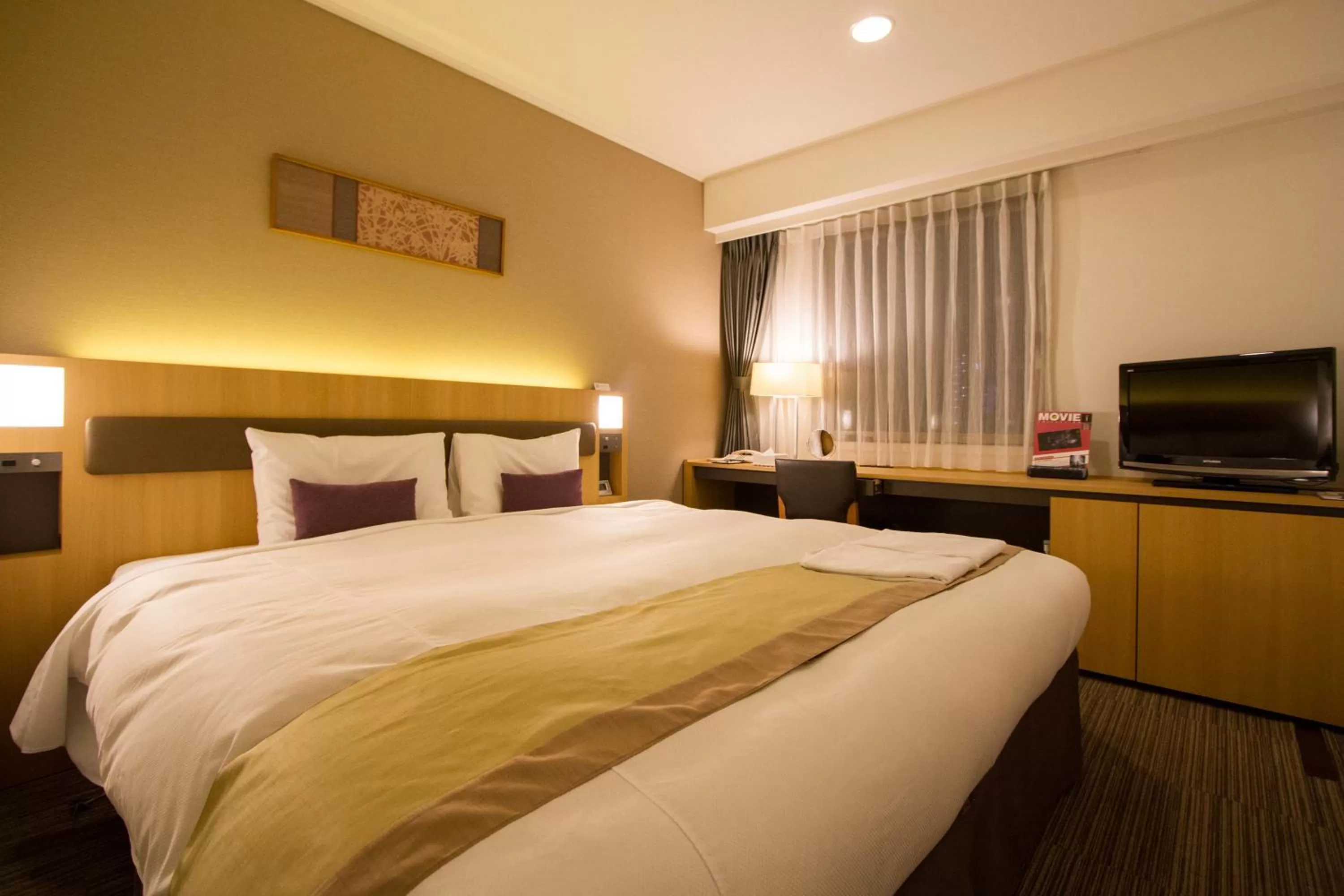 Bed in Hotel Sunroute Asakusa