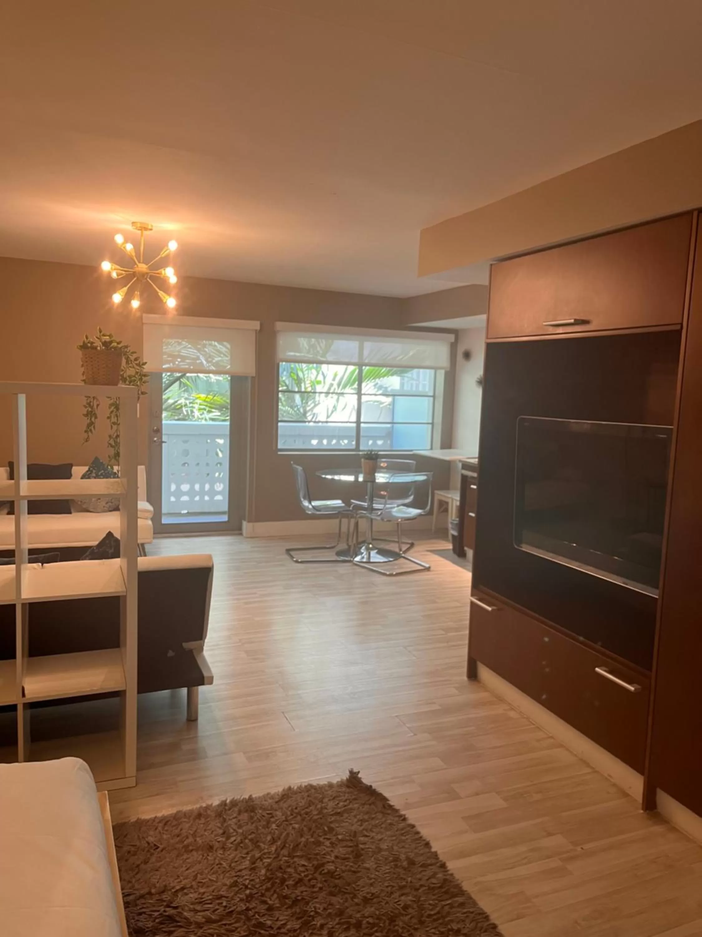 Living room, TV/Entertainment Center in Suites at The Strand on Ocean Drive
