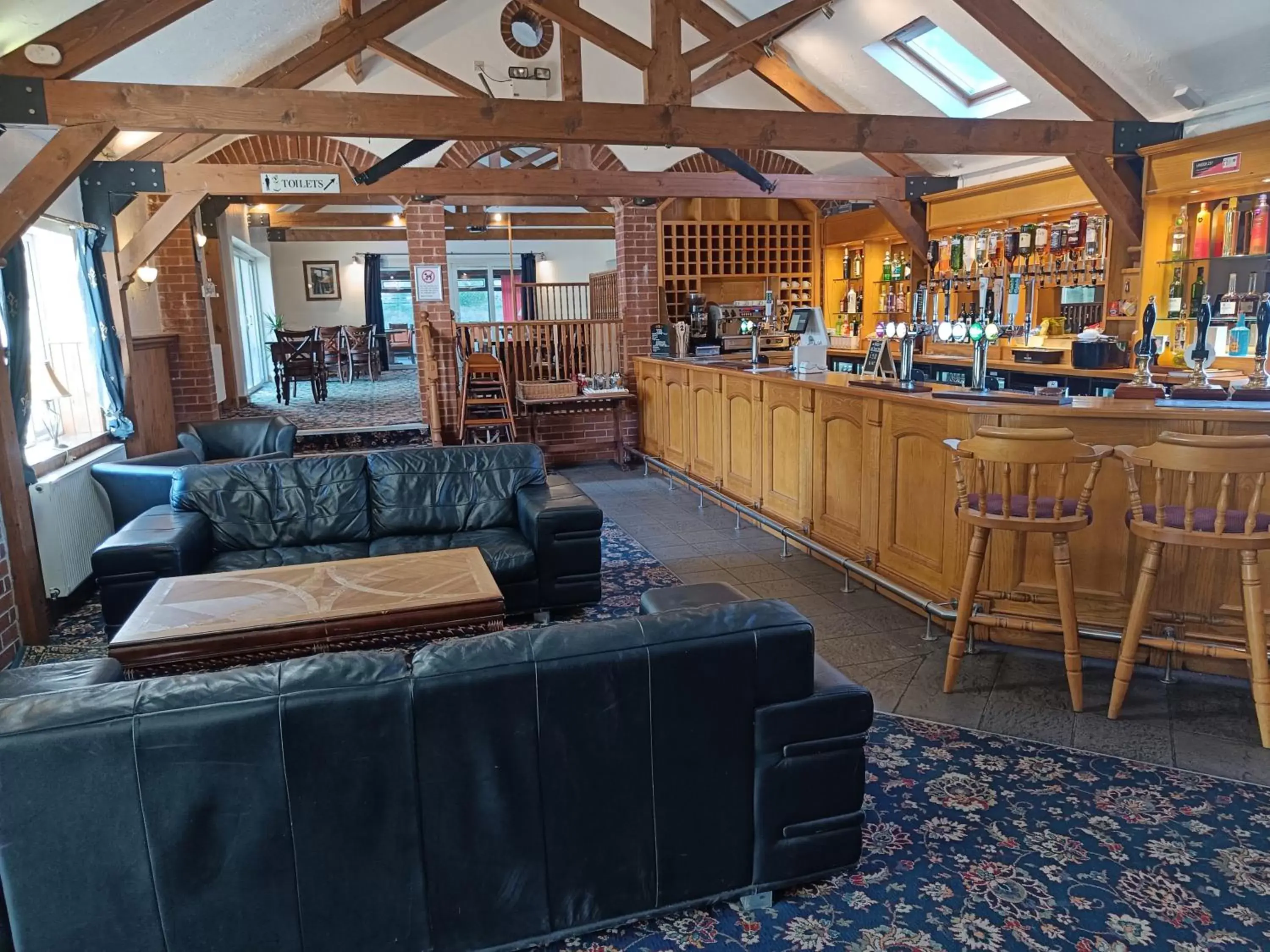 Lounge or bar in The Meldon Suite