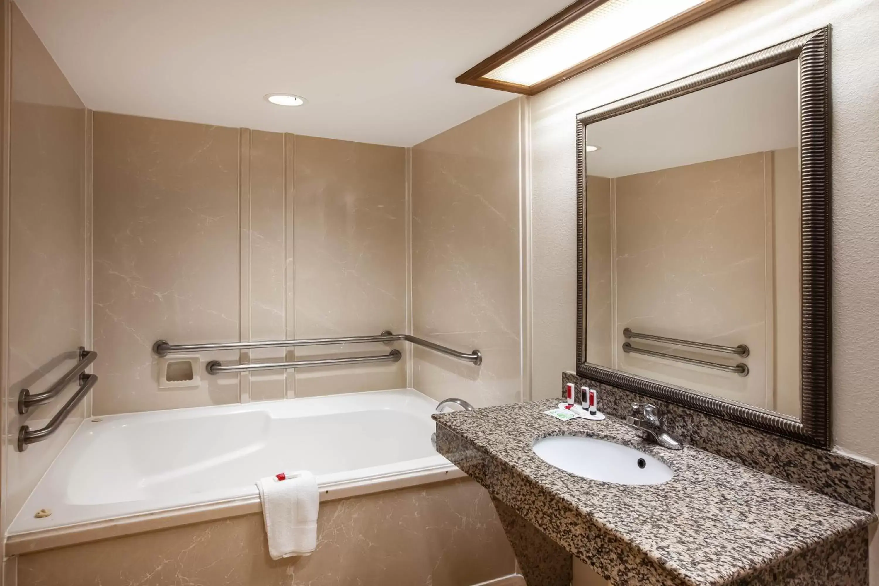 Bathroom in Days Inn & Suites by Wyndham Tyler