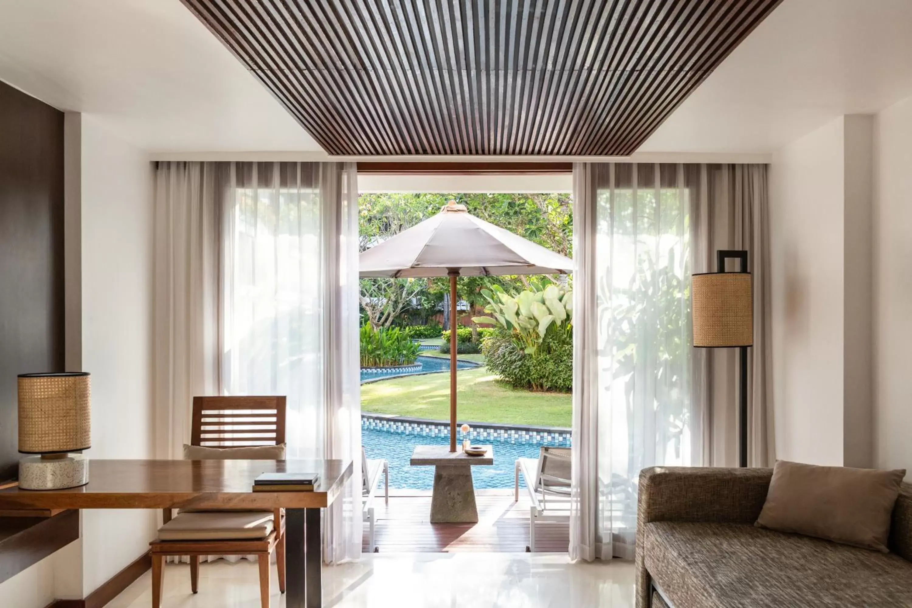 Living room, Pool View in Melia Bali