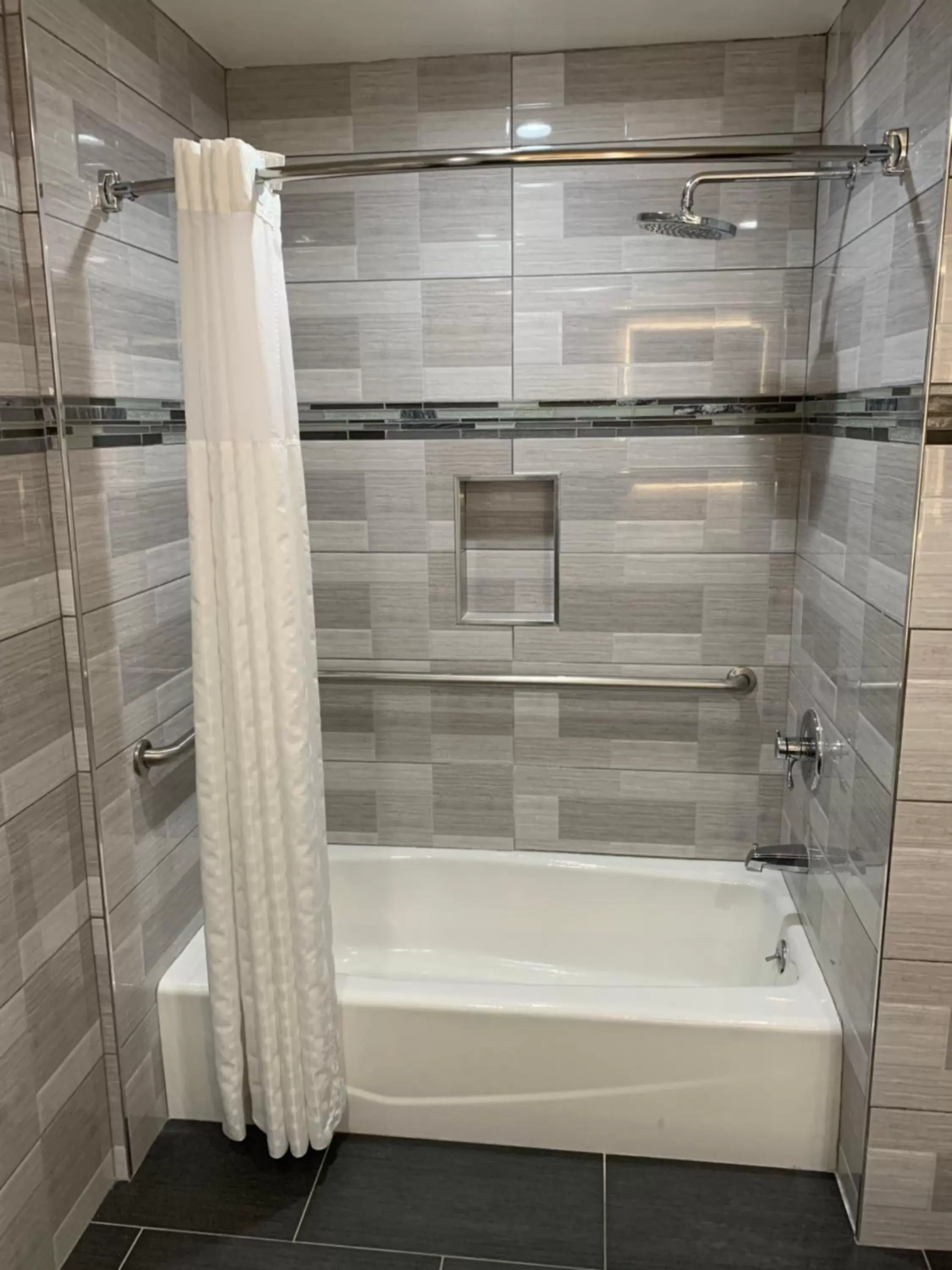Bathroom in Mirage Inn & Suites