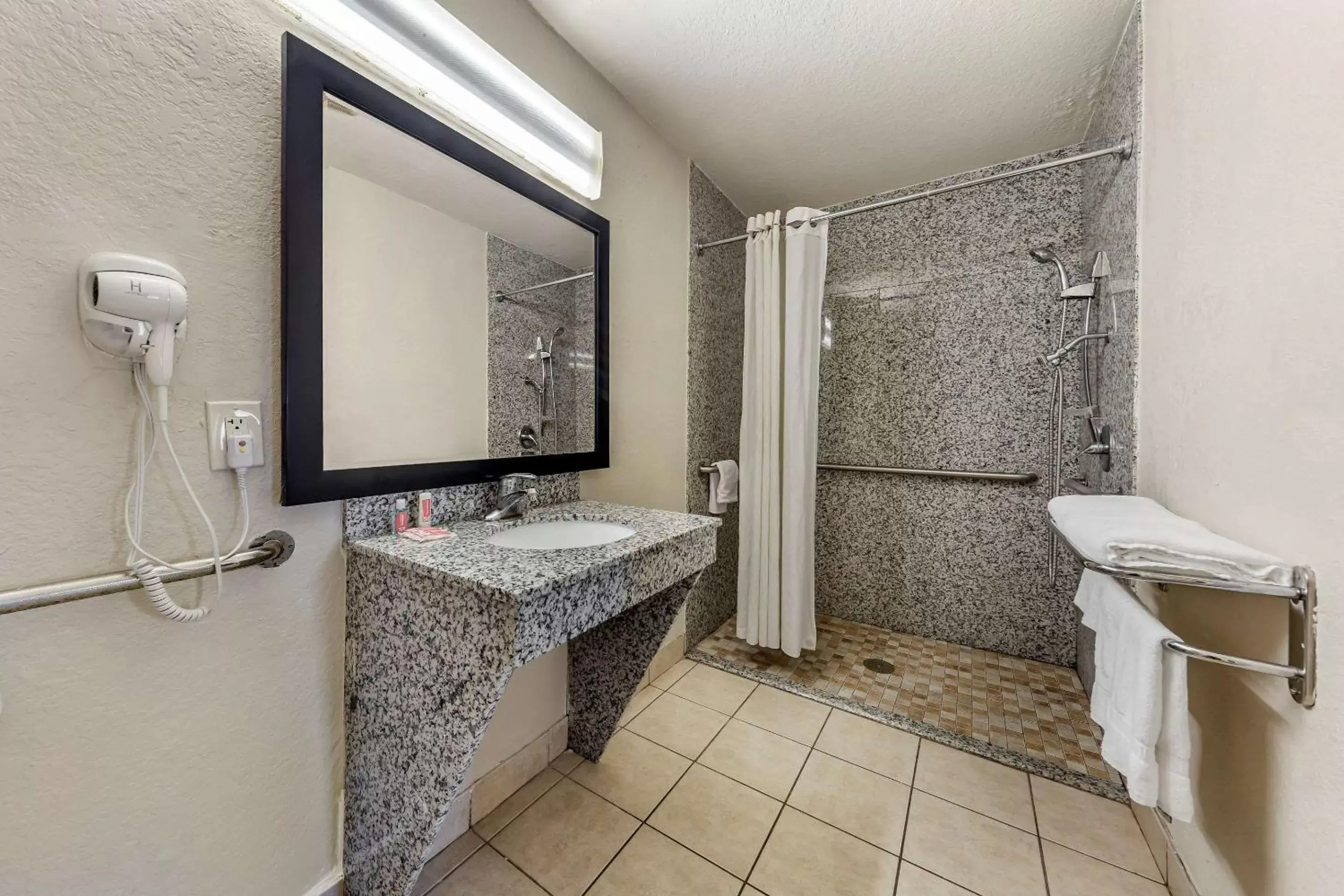 Bathroom in Econo Lodge Near Lackland Air Force Base-SeaWorld