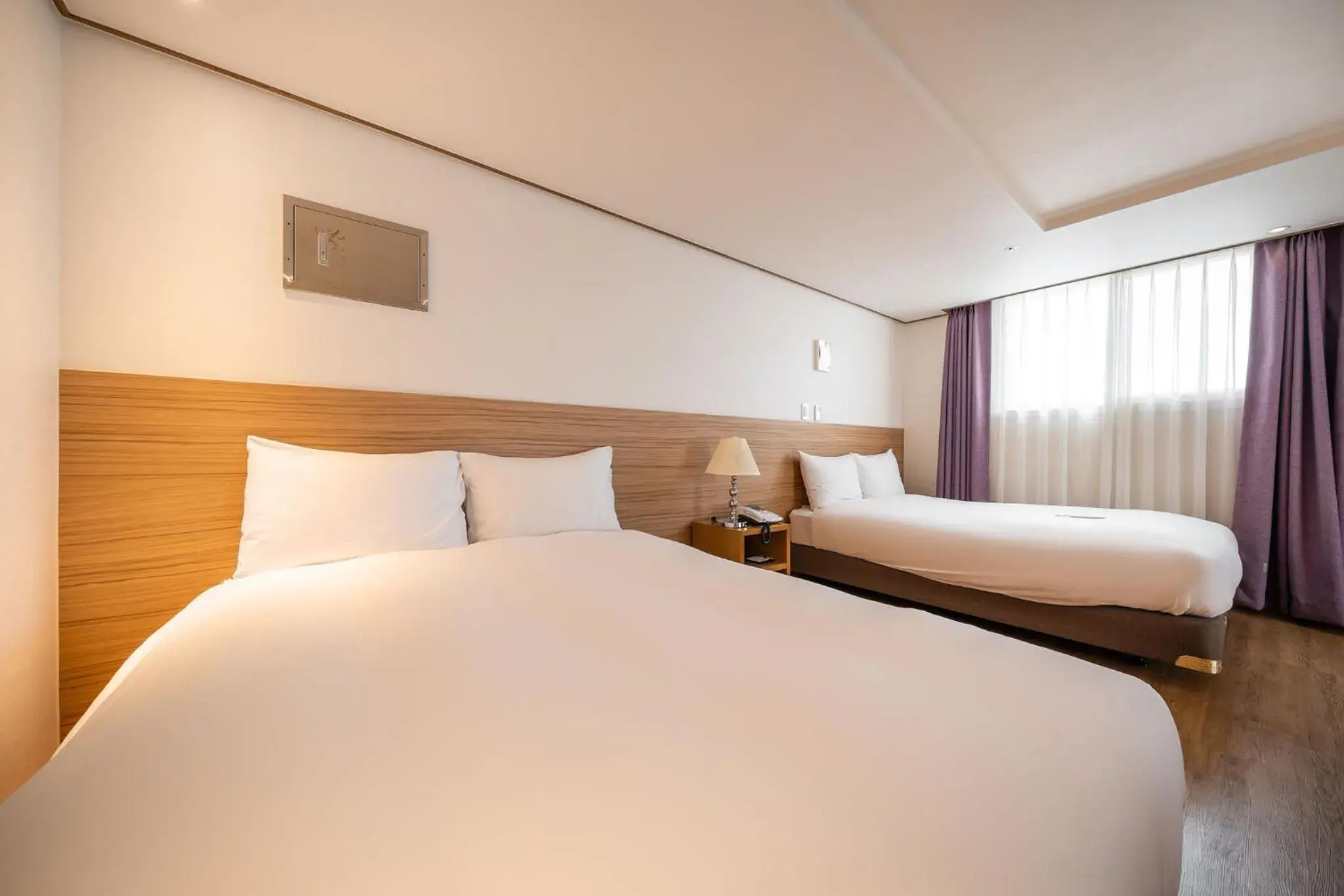 Bed in Hotel Rest Seogwipo
