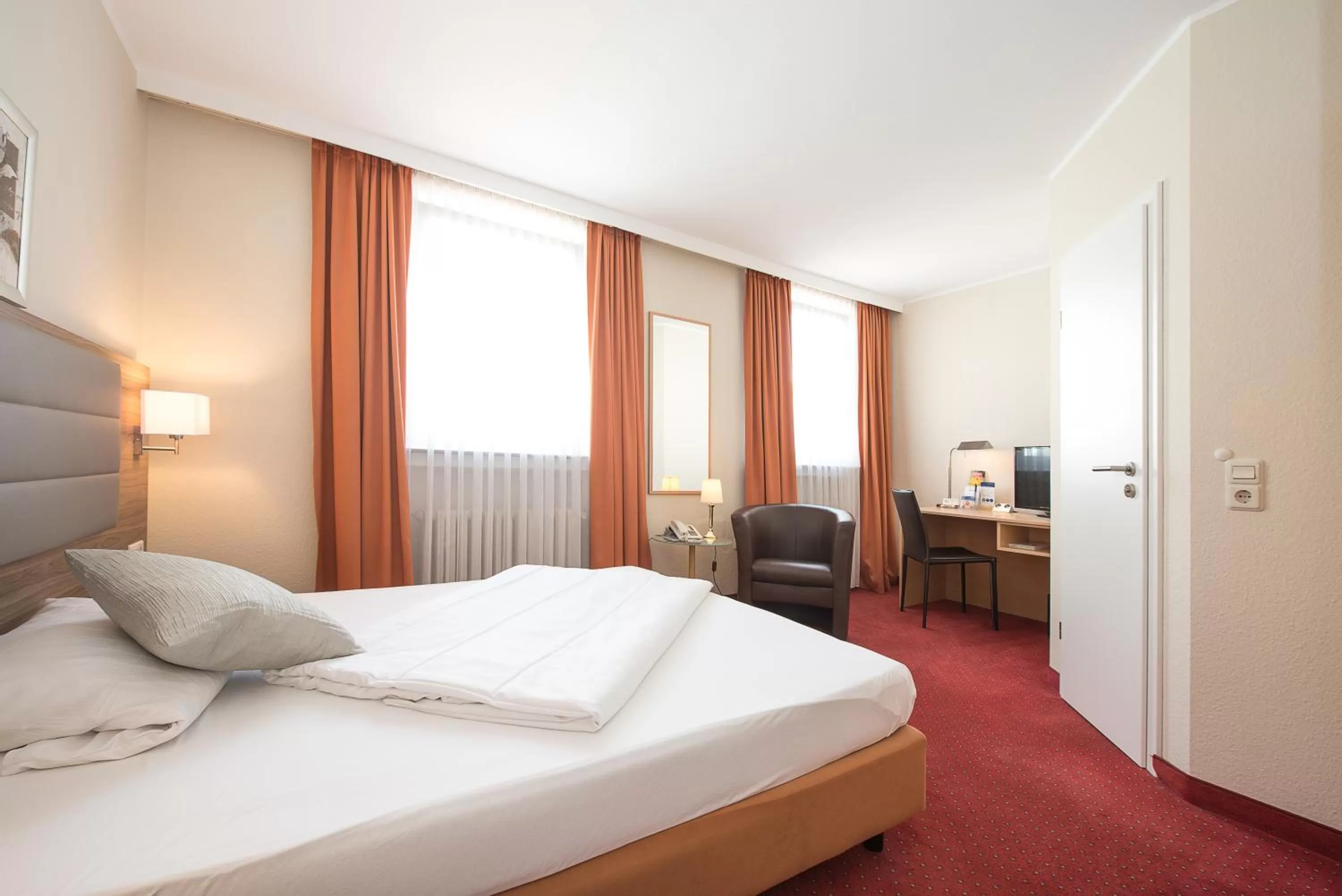 Photo of the whole room, Bed in Comfort Garni Stadtzentrum Hotel
