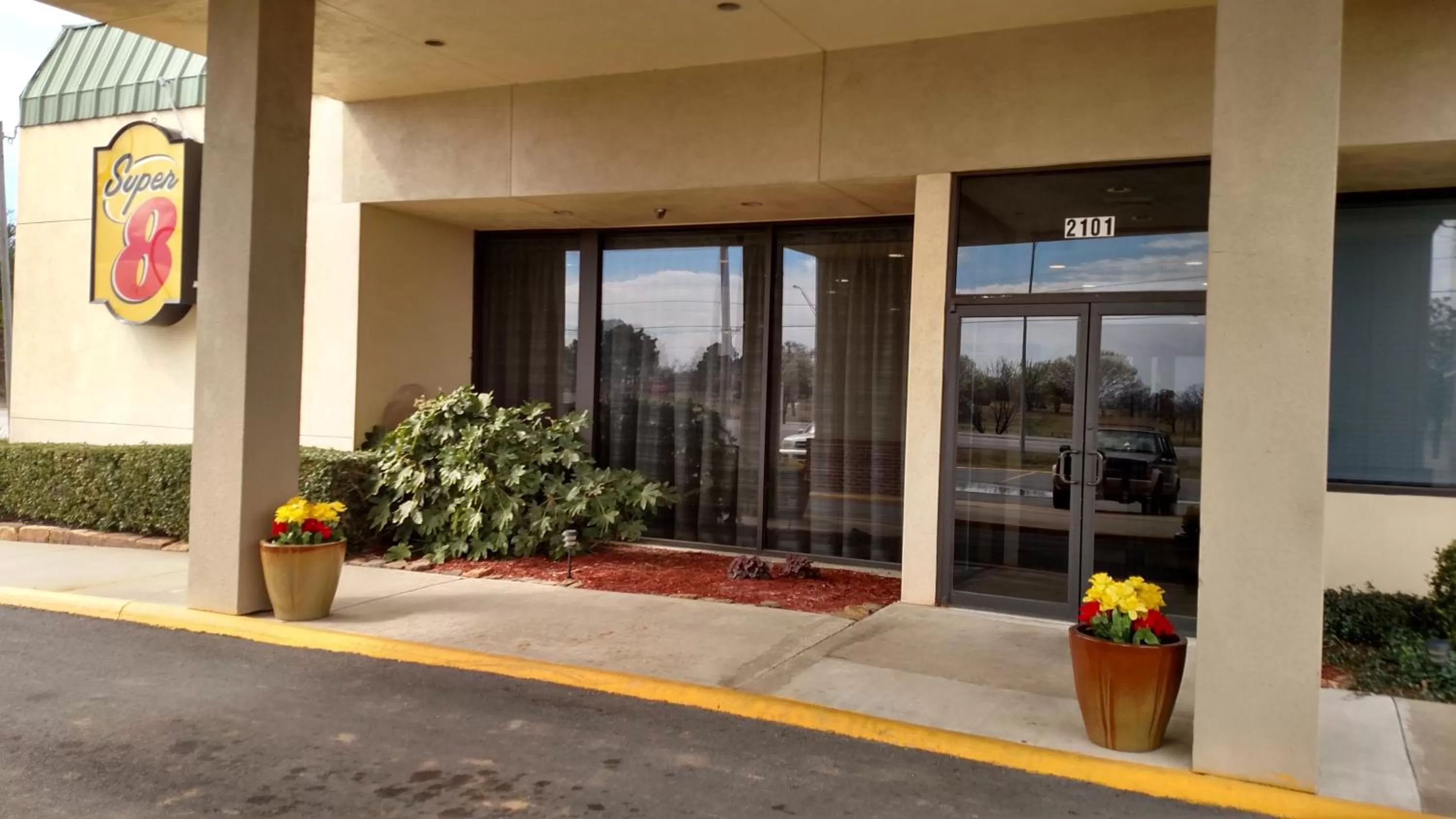 Property logo or sign in Super 8 by Wyndham Atoka