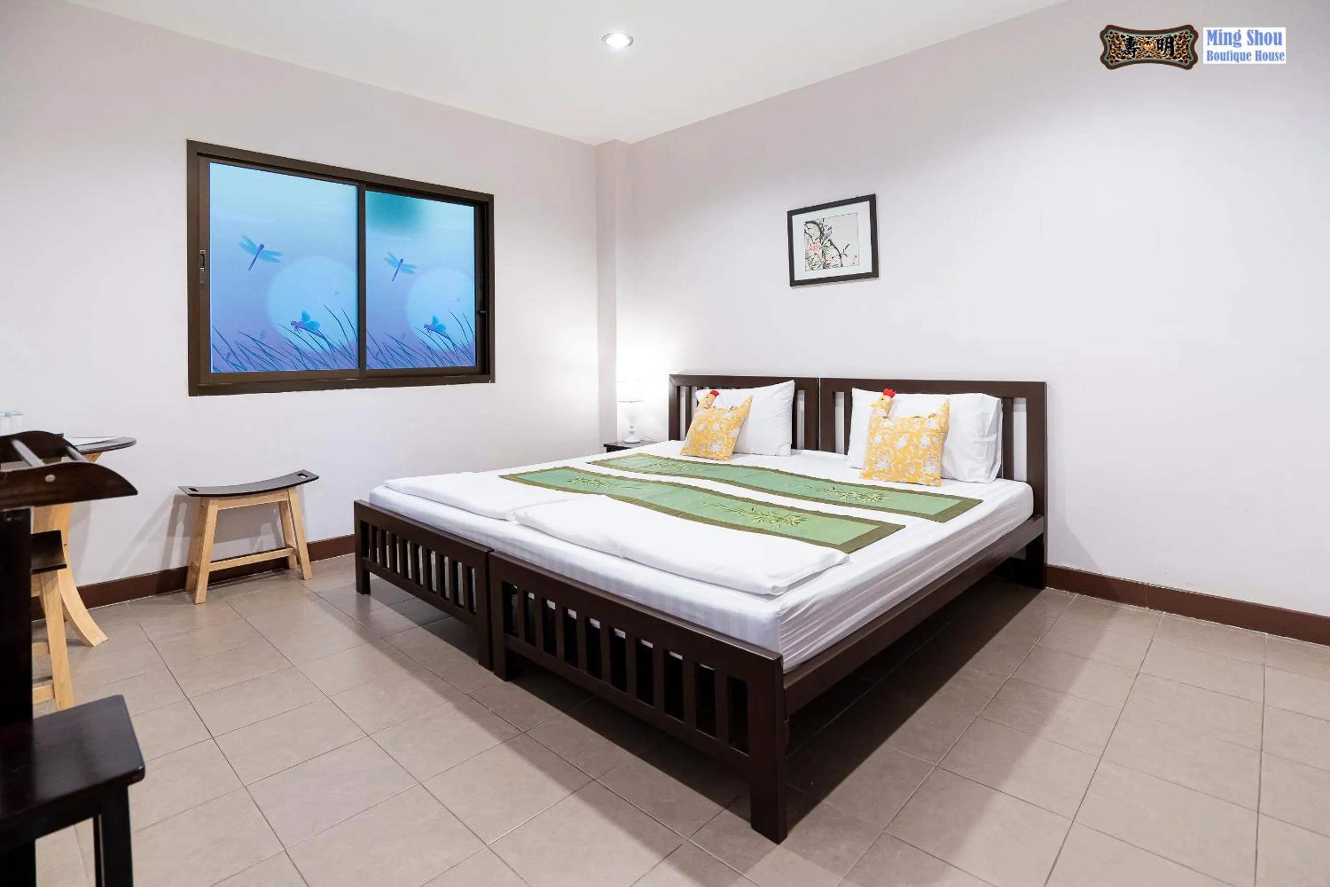 Bed in Ming Shou Boutique House
