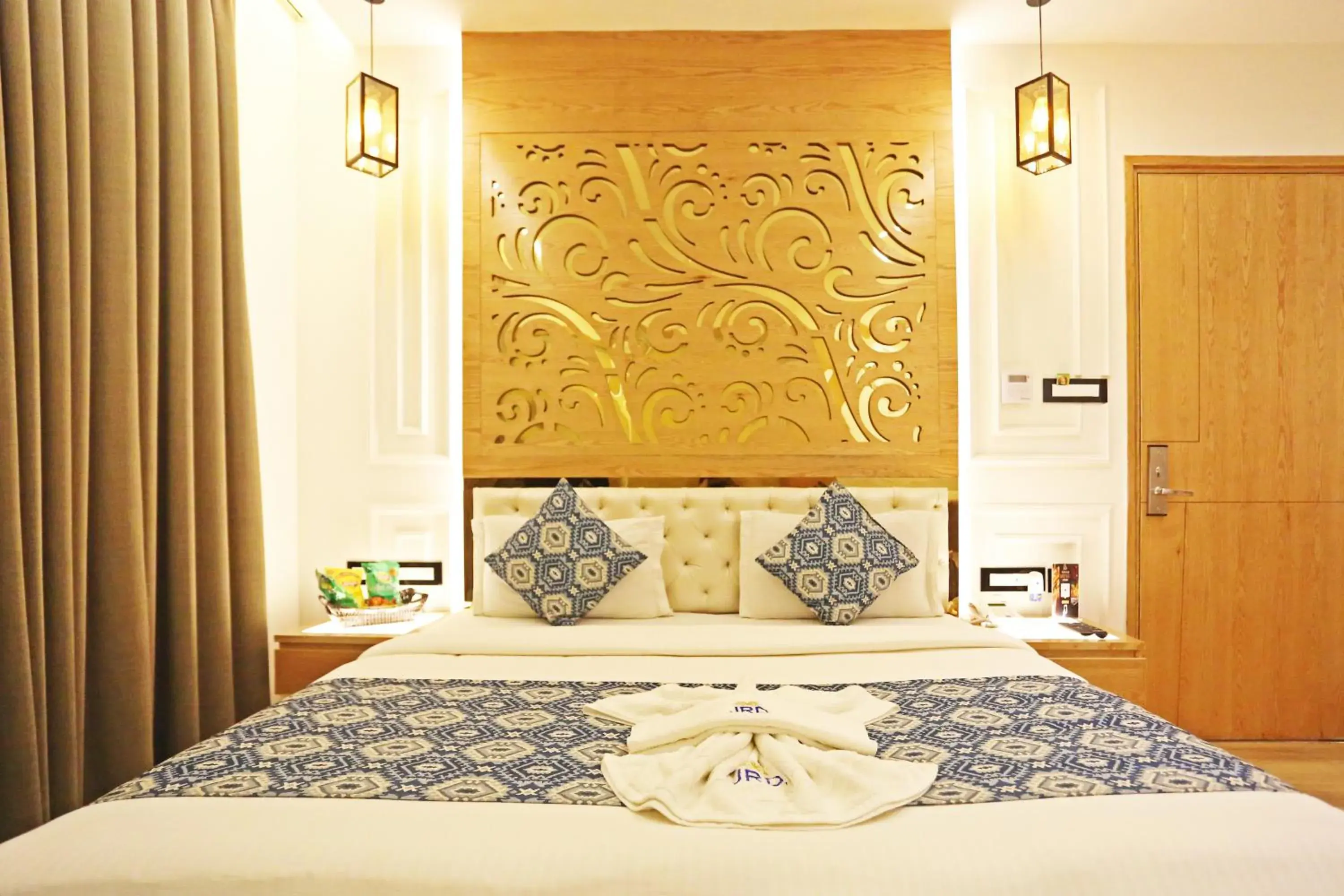 Bed in The Jrd Luxury Boutique Hotel