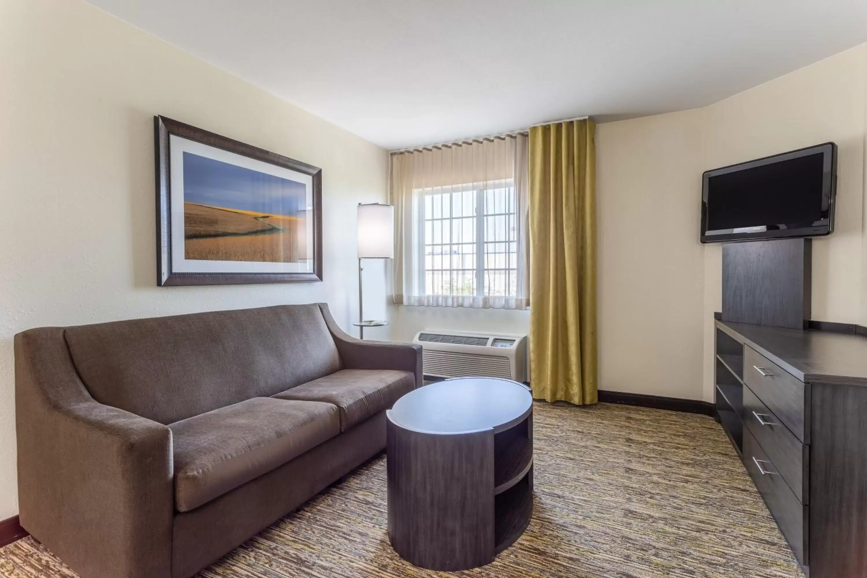 Photo of the whole room, Seating Area in Candlewood Suites Aurora-Naperville, an IHG Hotel