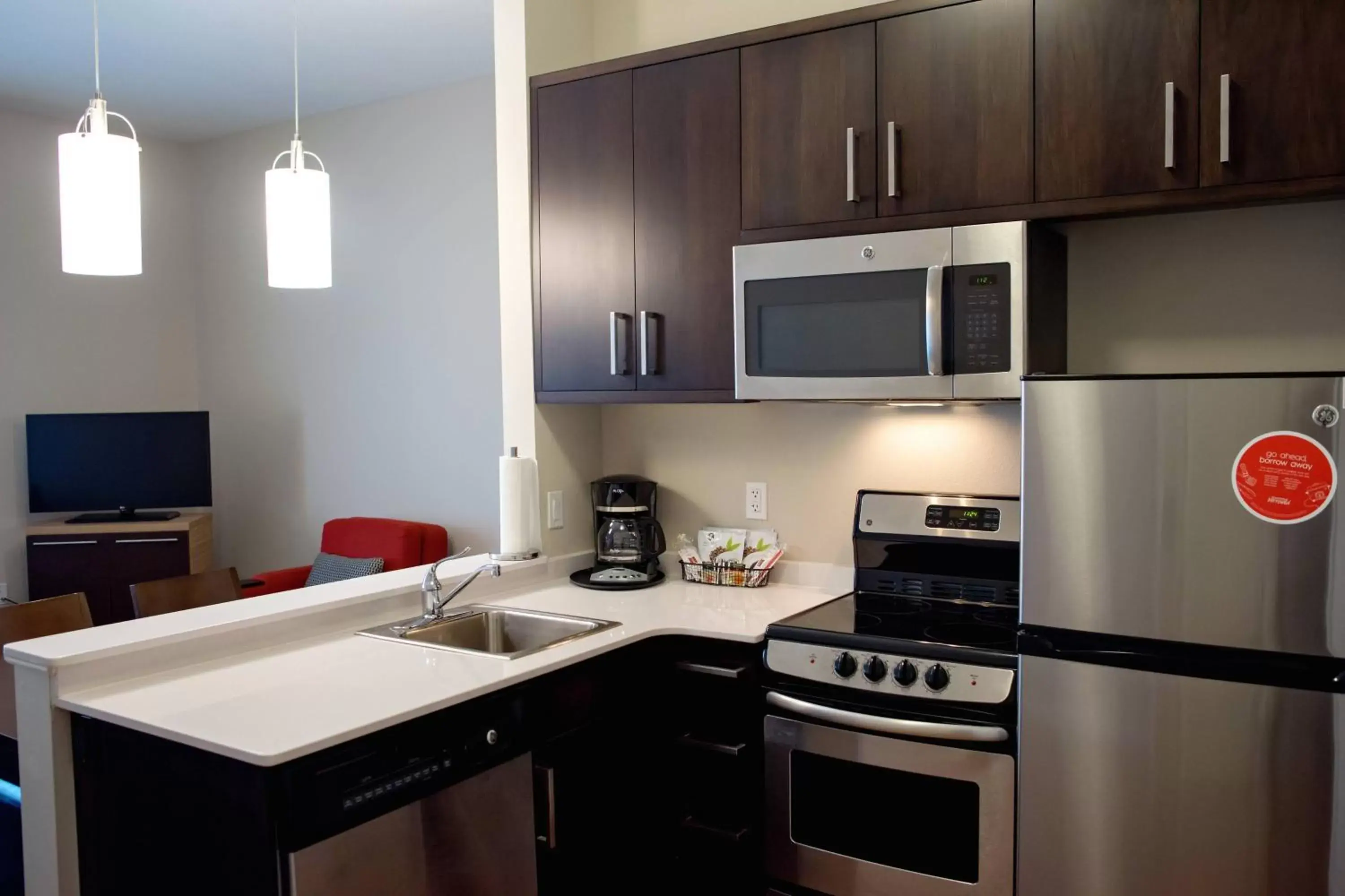 Photo of the whole room, Kitchen/Kitchenette in TownePlace Suites by Marriott Ames