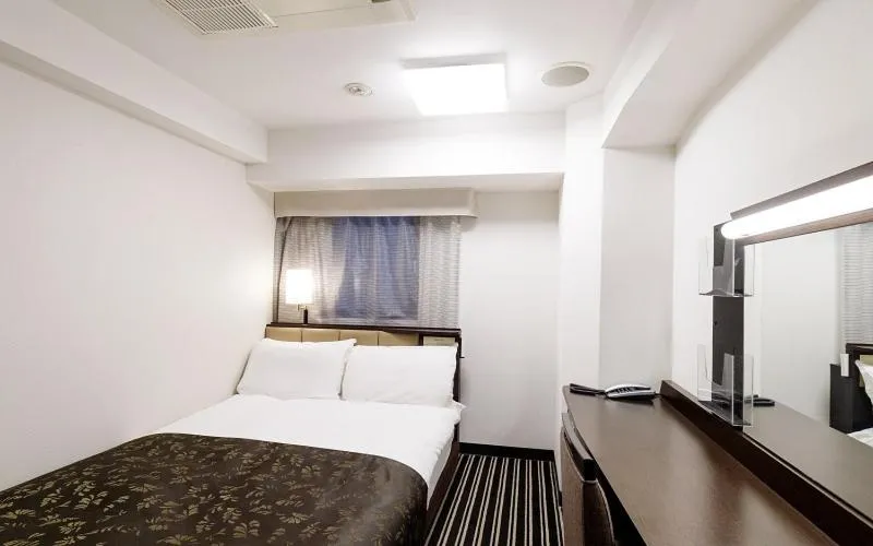 Bed in APA Hotel Ginza Kyobashi Tokyo Eki Yaesu Minamiguchi