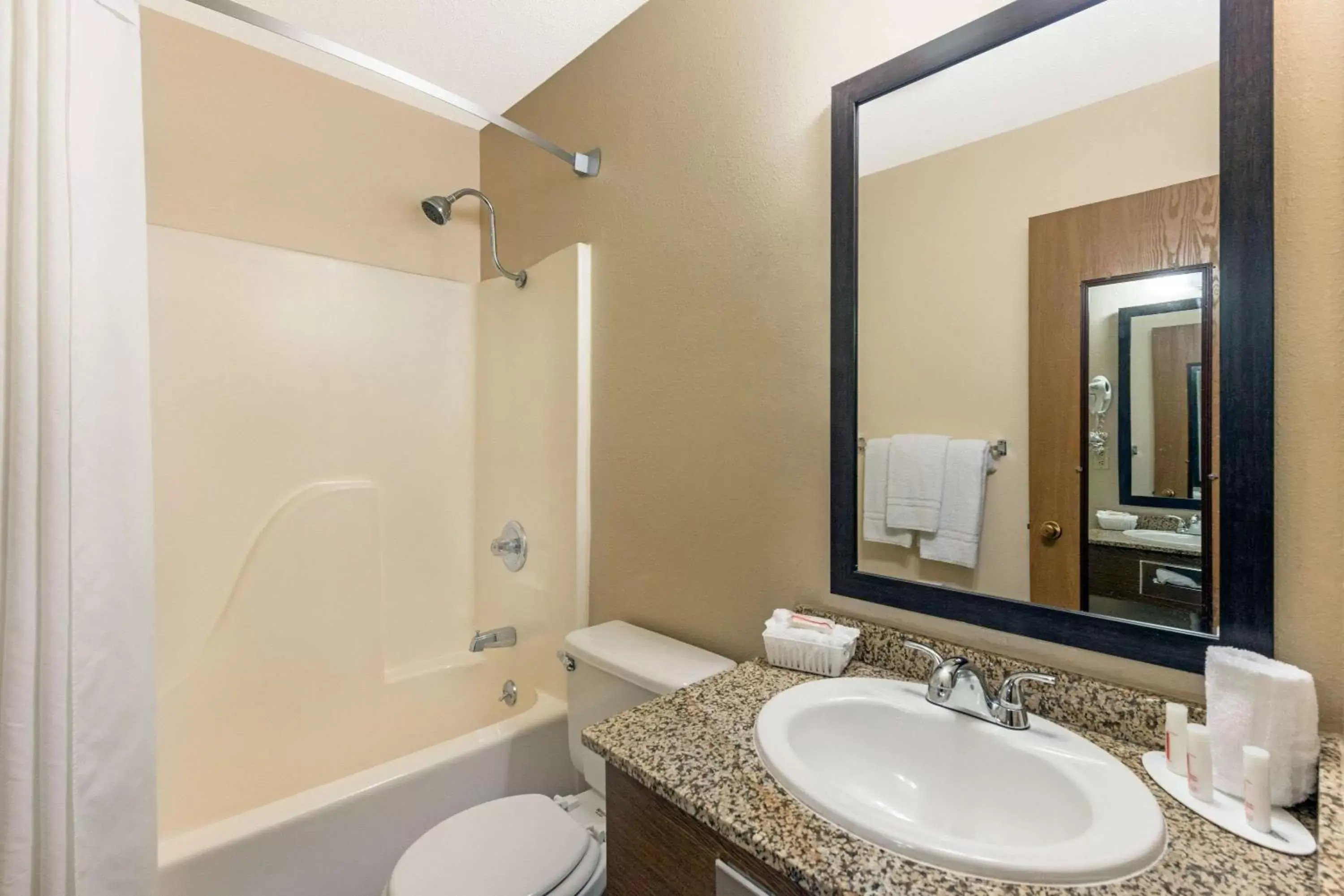 Bathroom in Super 8 by Wyndham Poplar Bluff Missouri