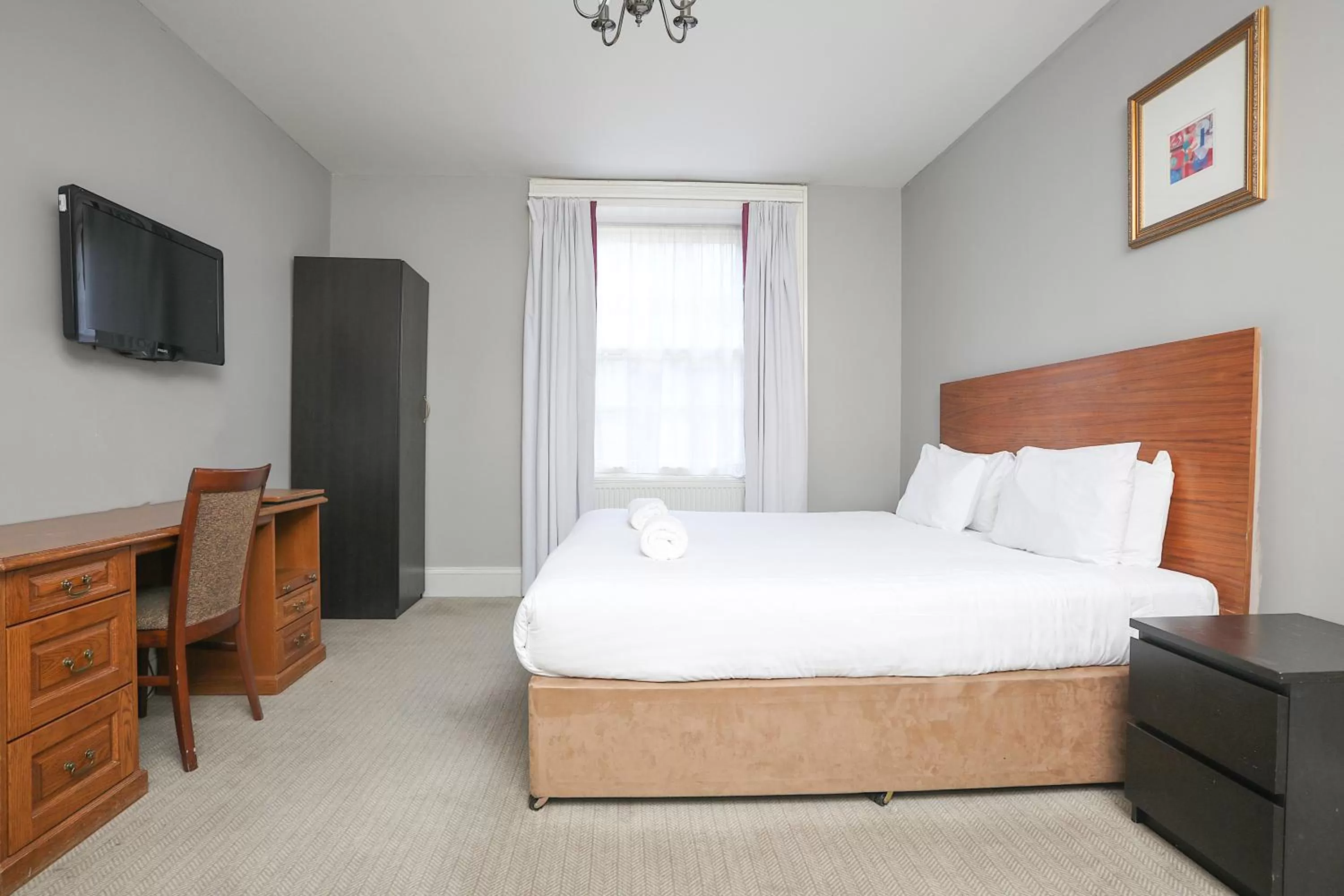 Bed in Cairn Hotel & Apartments