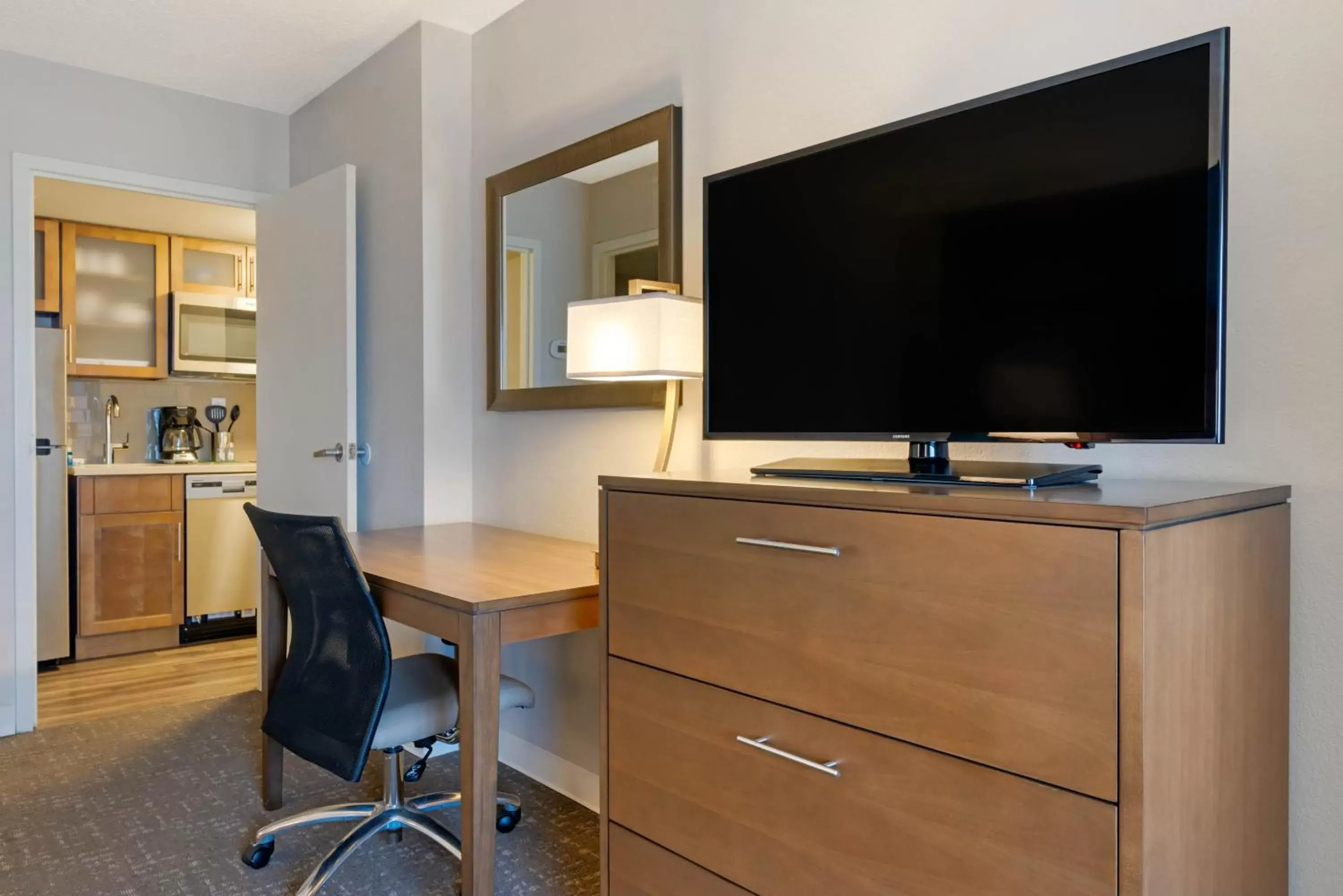 Photo of the whole room, TV/Entertainment Center in Staybridge Suites Orlando Royale Parc Suites, an IHG Hotel