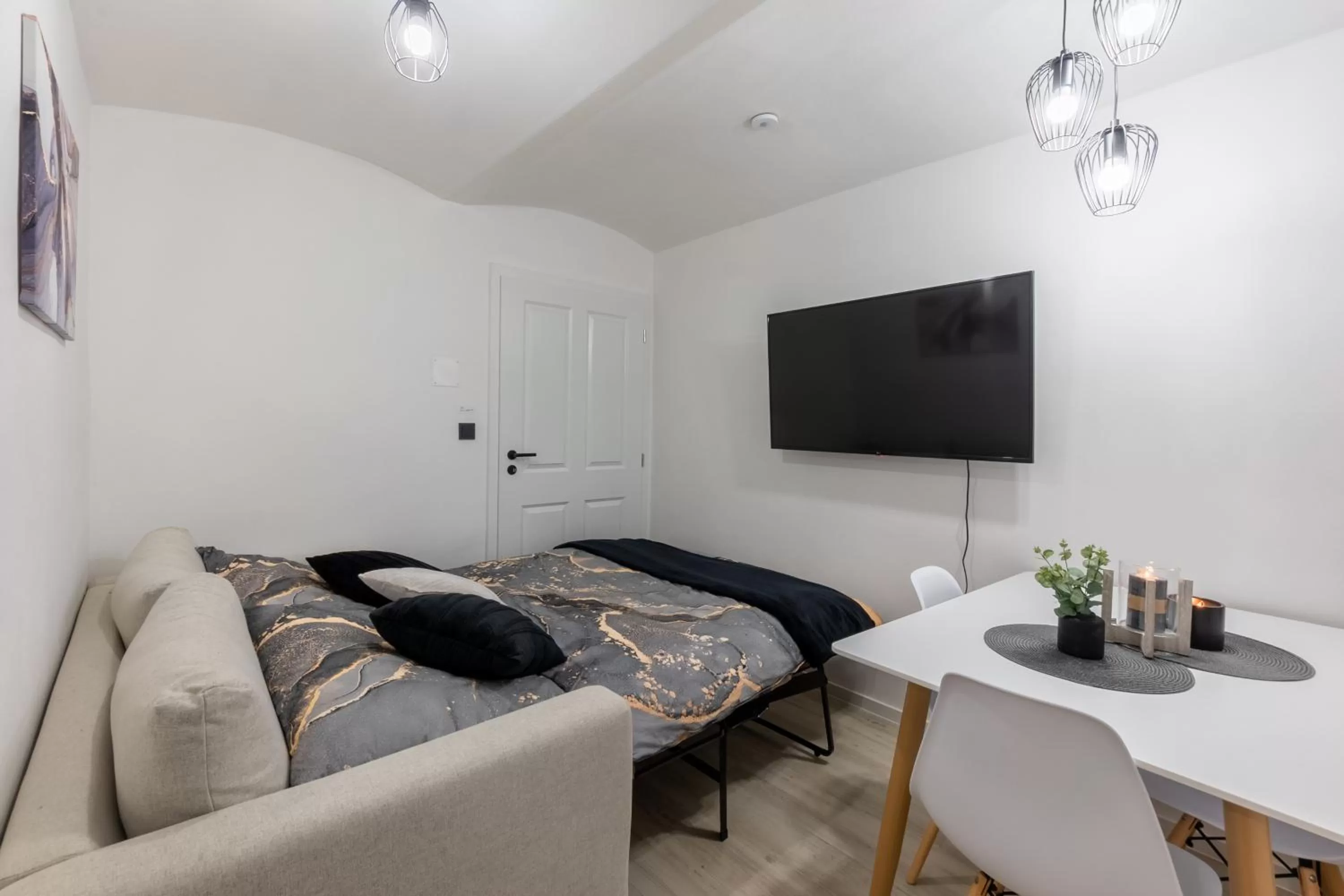 Communal lounge/ TV room, Bed in Wellness Apartmány Vila Republika