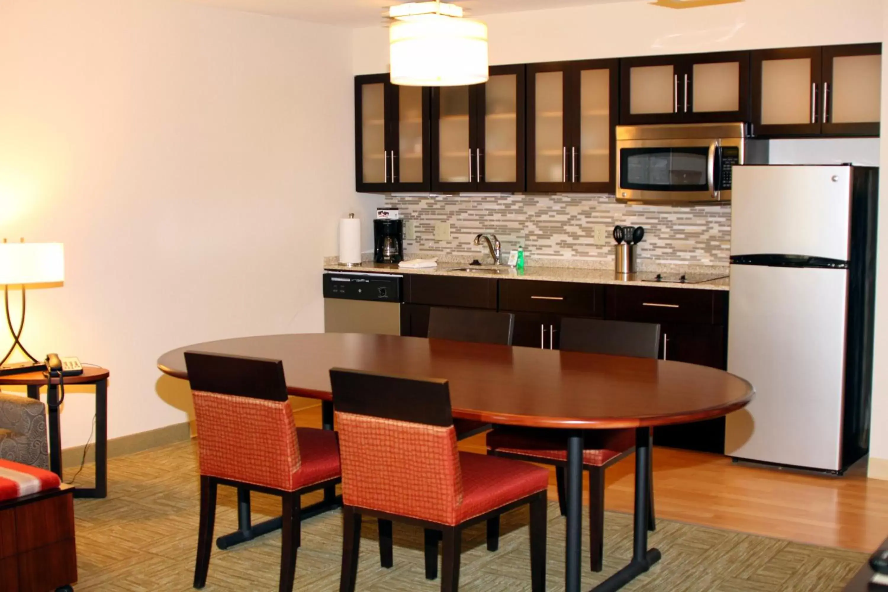 Photo of the whole room, Kitchen/Kitchenette in Staybridge Suites Syracuse Liverpool, an IHG Hotel