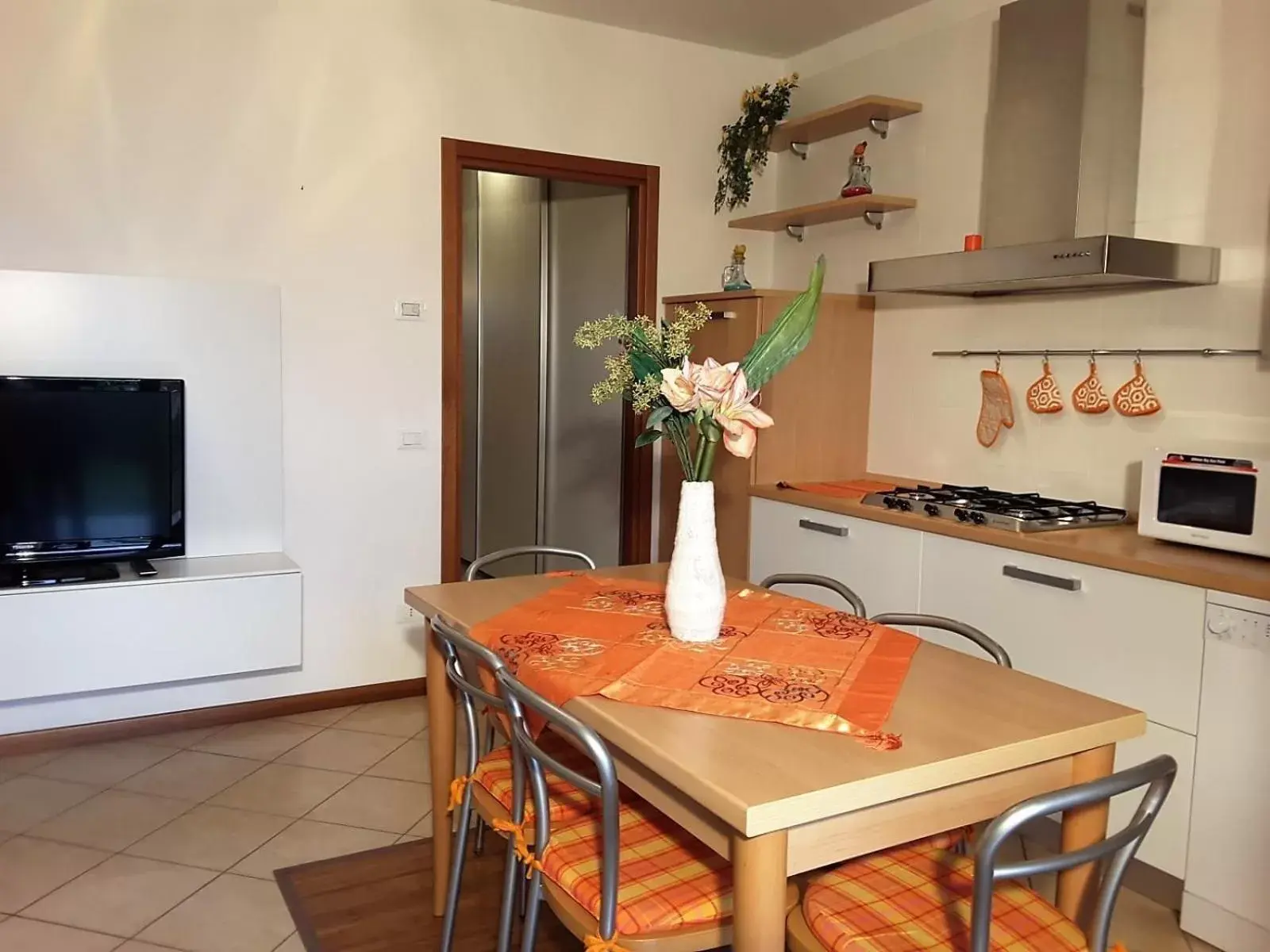 TV and multimedia, Dining Area in Villaggio dei Fiori Apart- Hotel 3 Stars - Family Resort