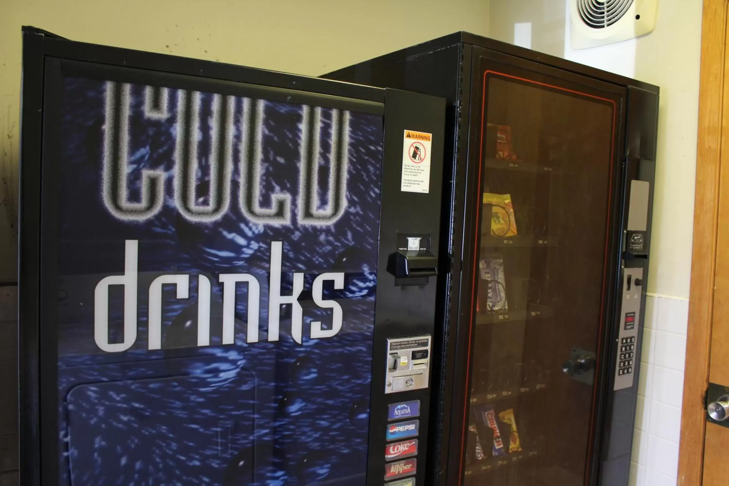 vending machine, Property Logo/Sign in Budget Host Inn Fridley