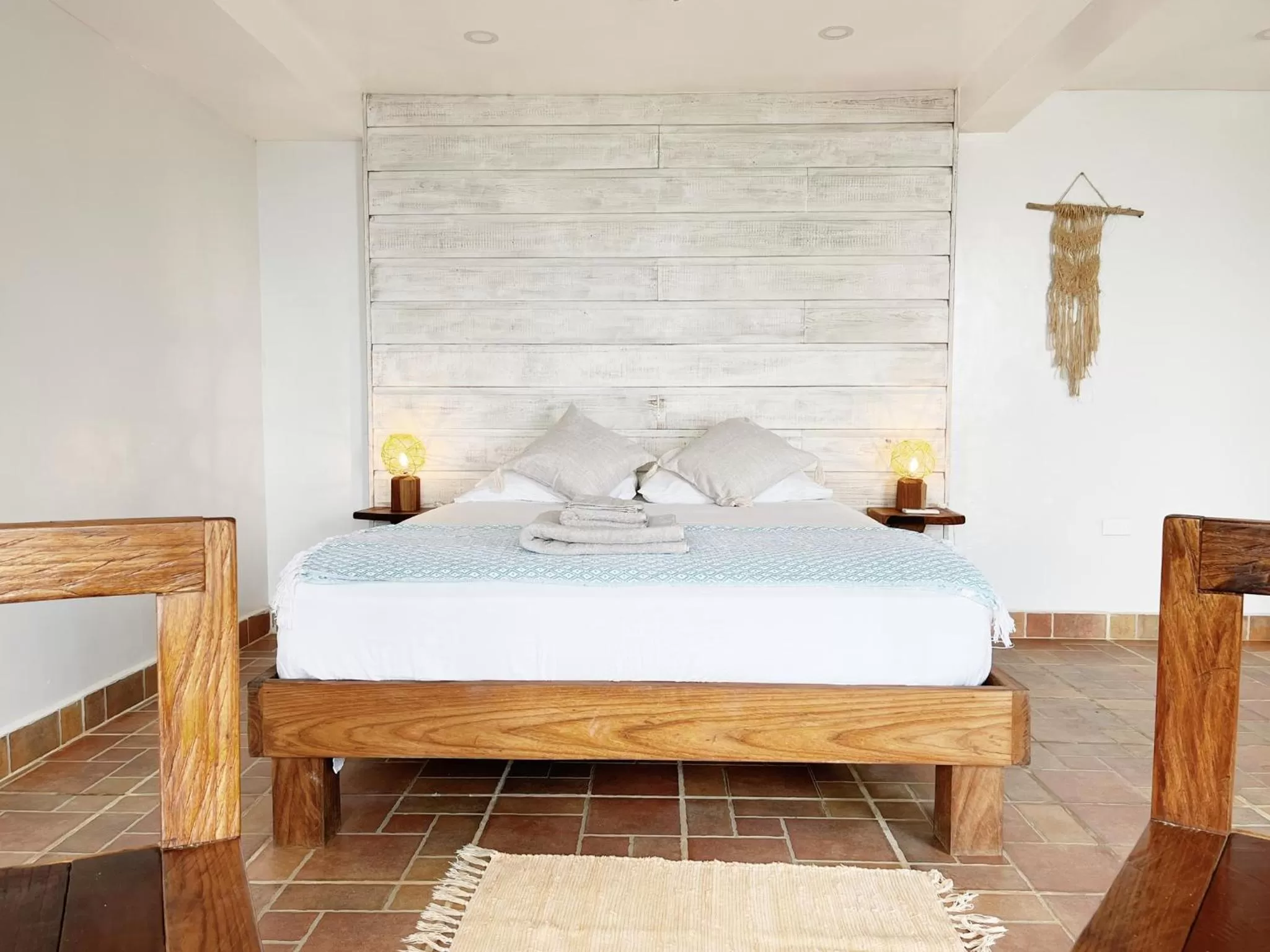 Photo of the whole room, Bed in Bird Island Bungalows