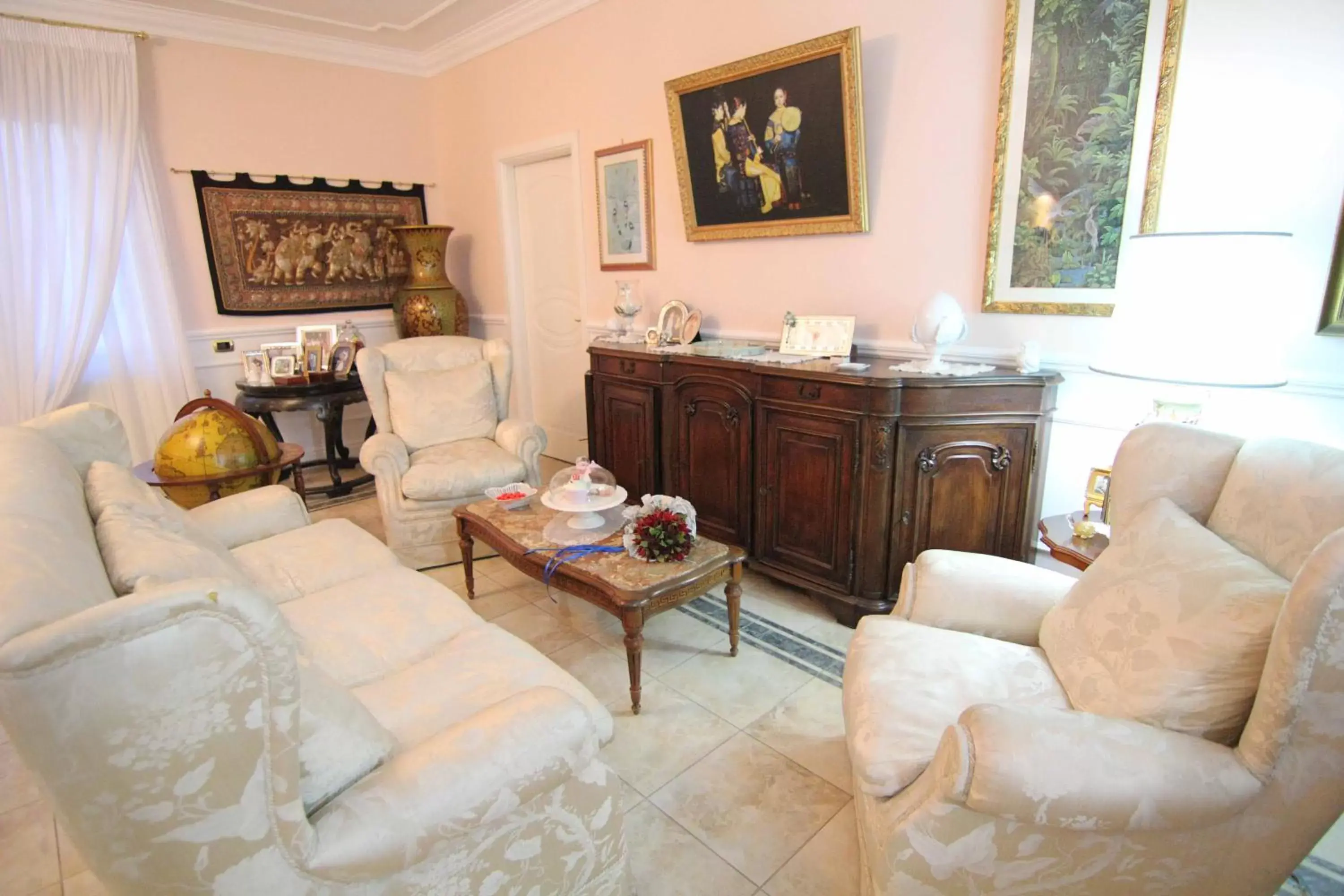 Communal lounge/ TV room, Seating Area in Il Giardino delle Jacaranda