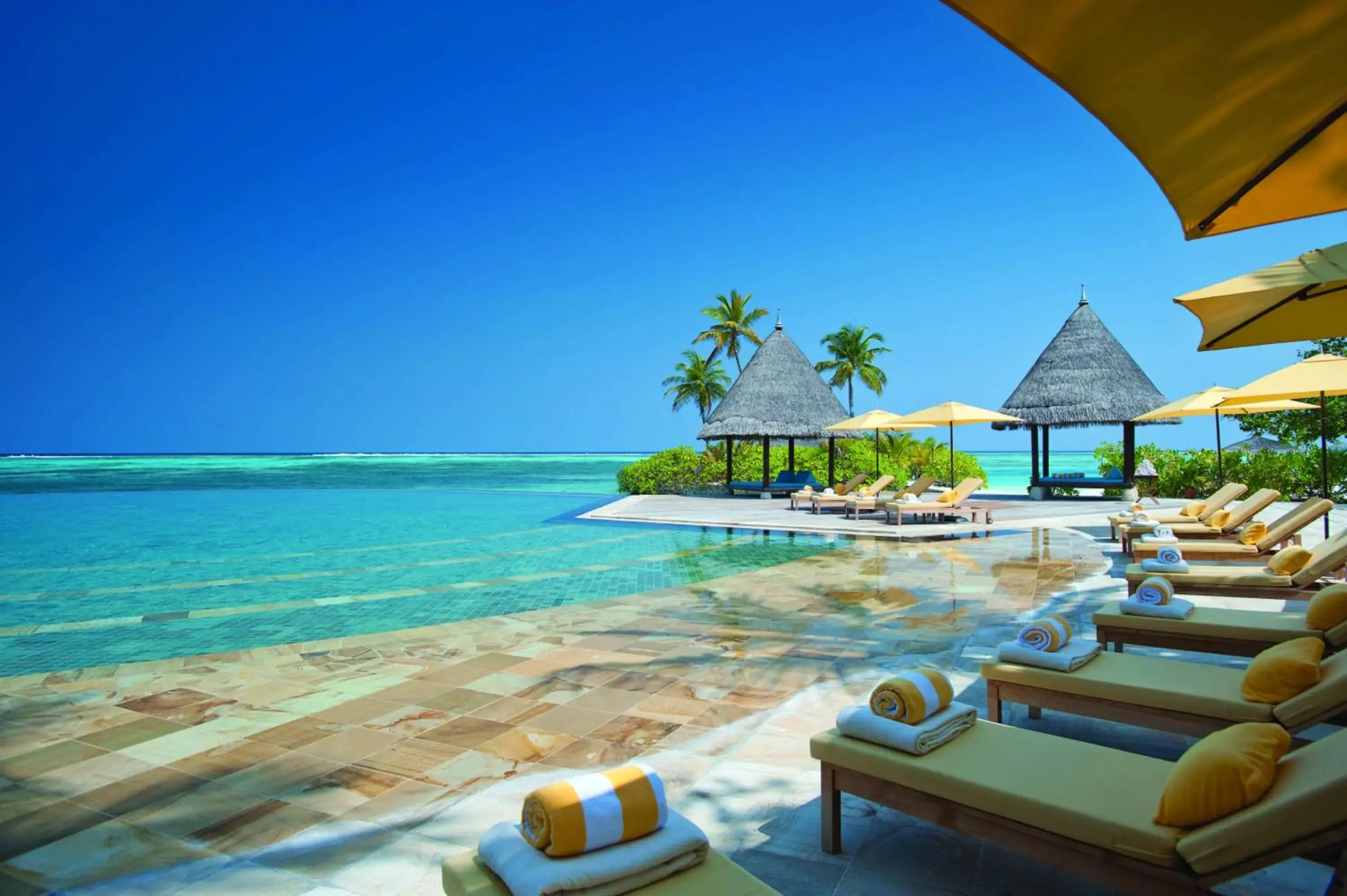 Property building, Beach in Four Seasons Resort Maldives at Kuda Huraa