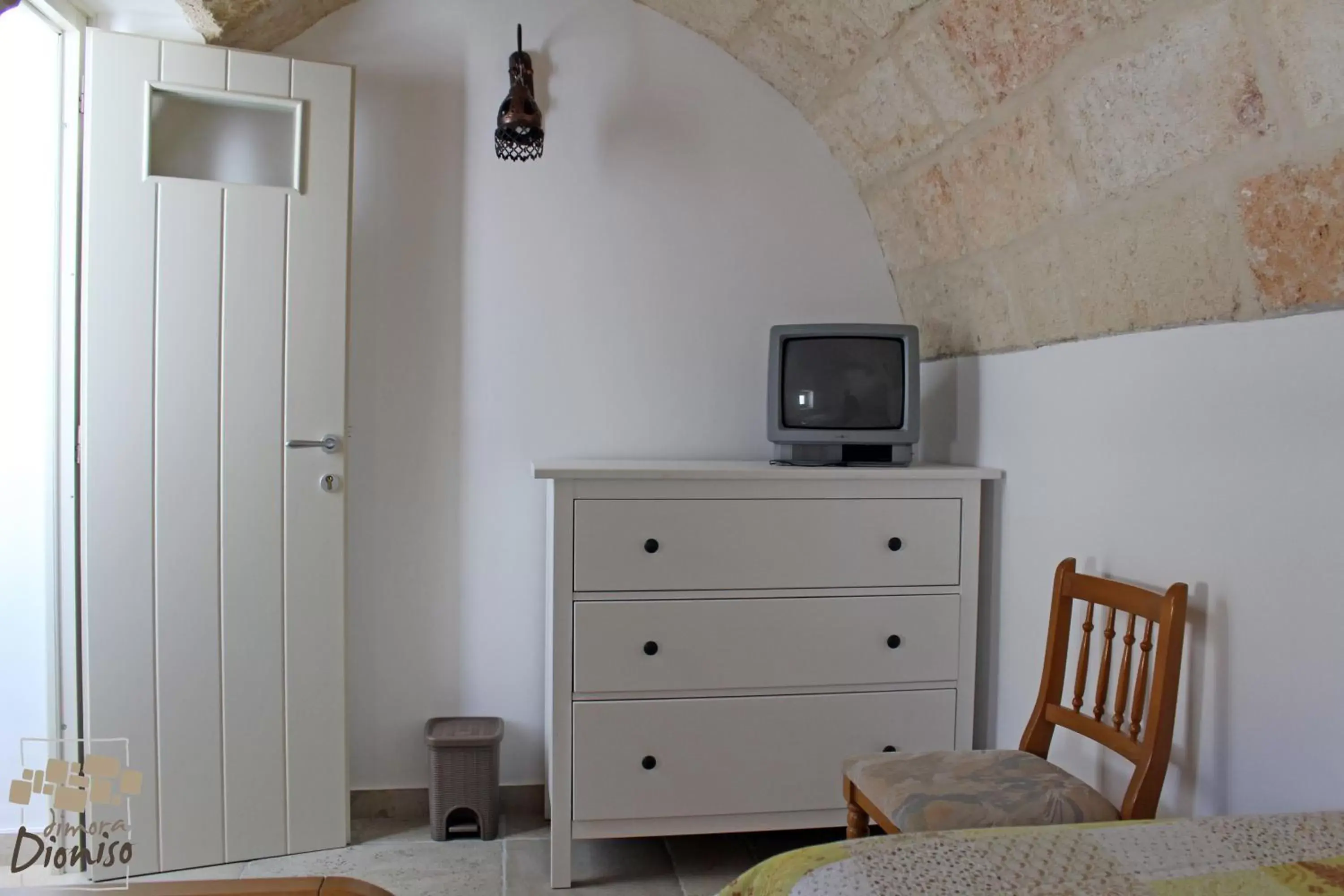 Bed, TV/Entertainment Center in Dimora Dioniso