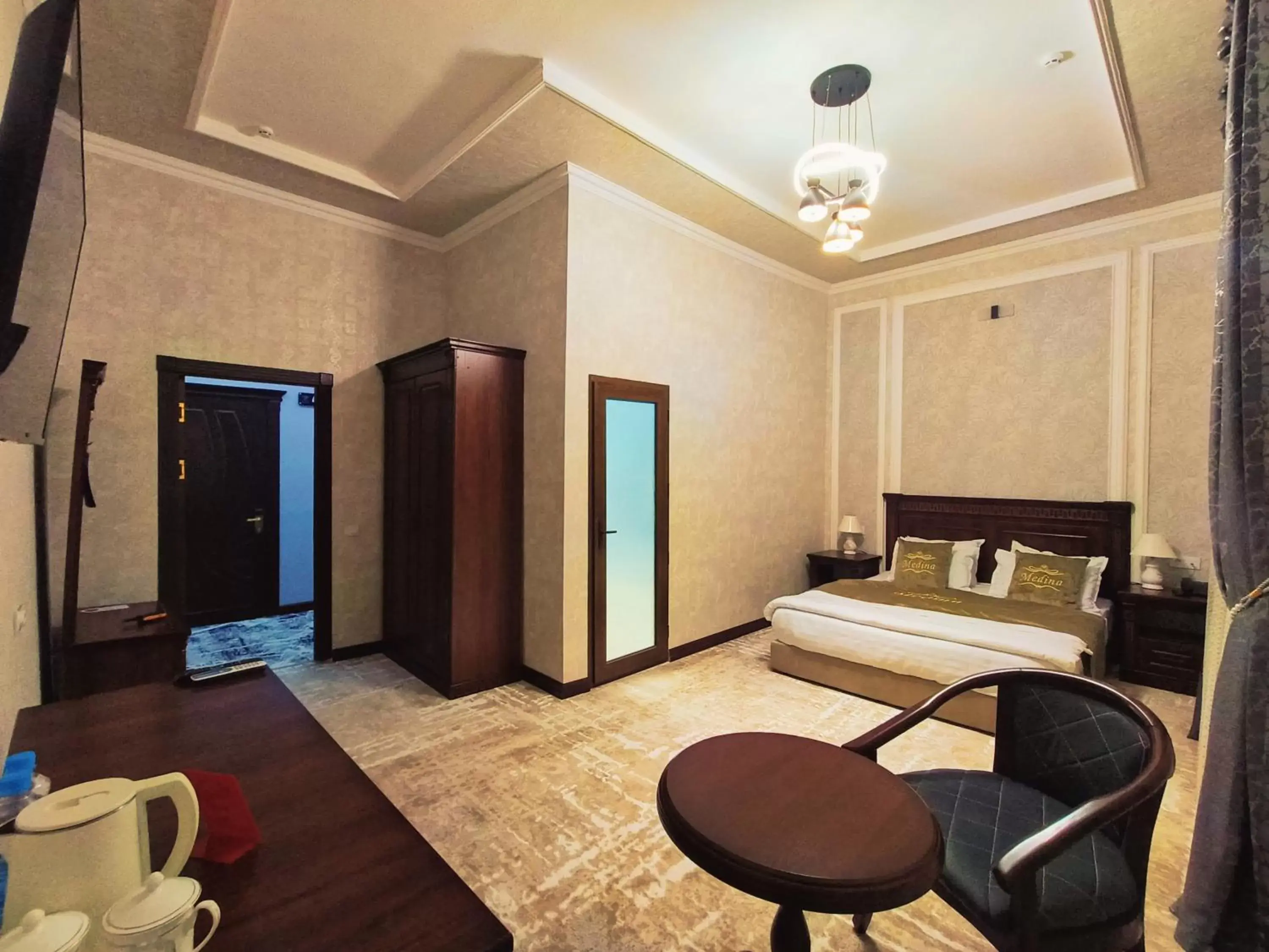 Bed, Seating Area in Medina Hotel Samarkand