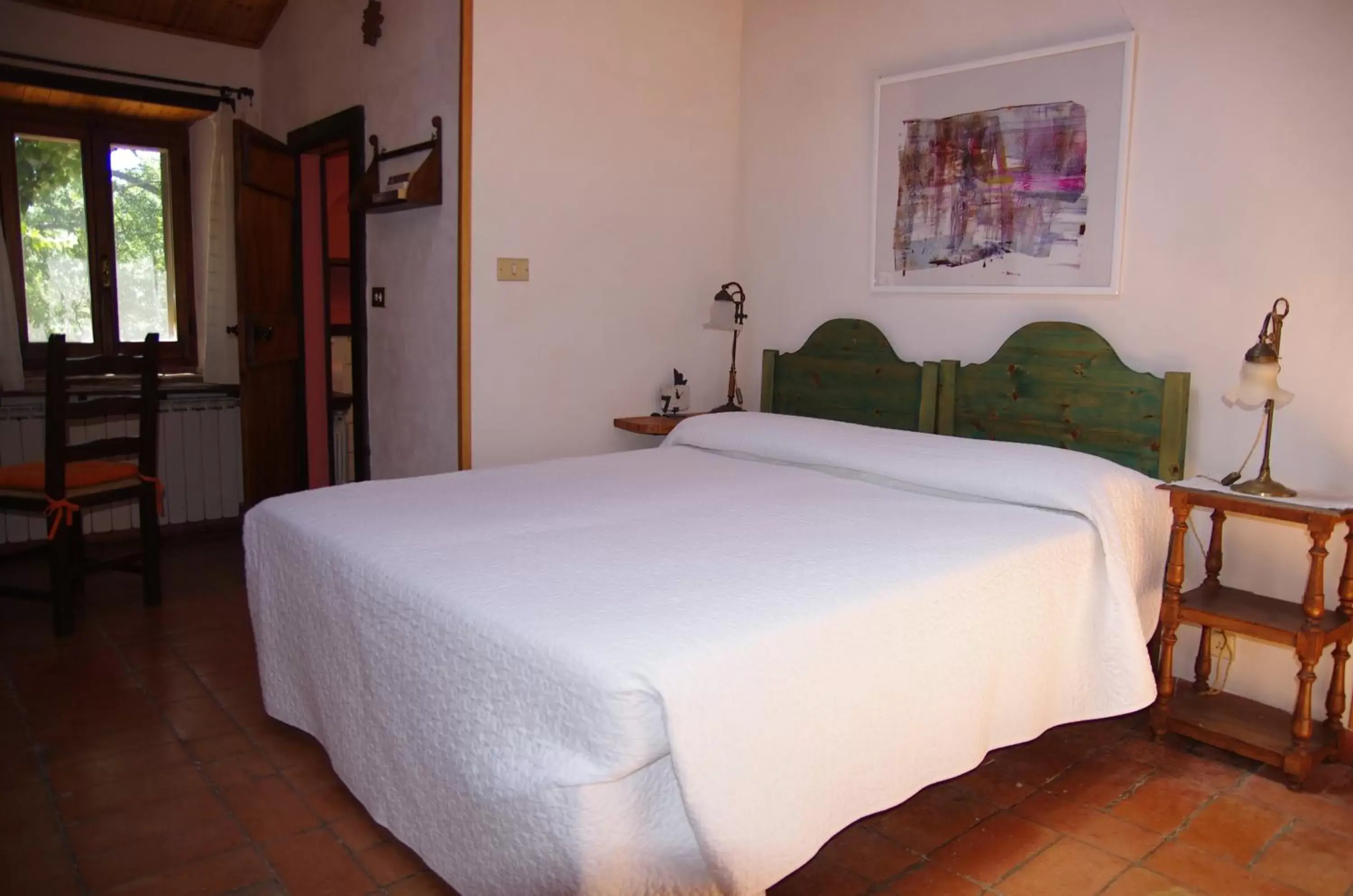 Photo of the whole room, Bed in Podere Pinzicalari