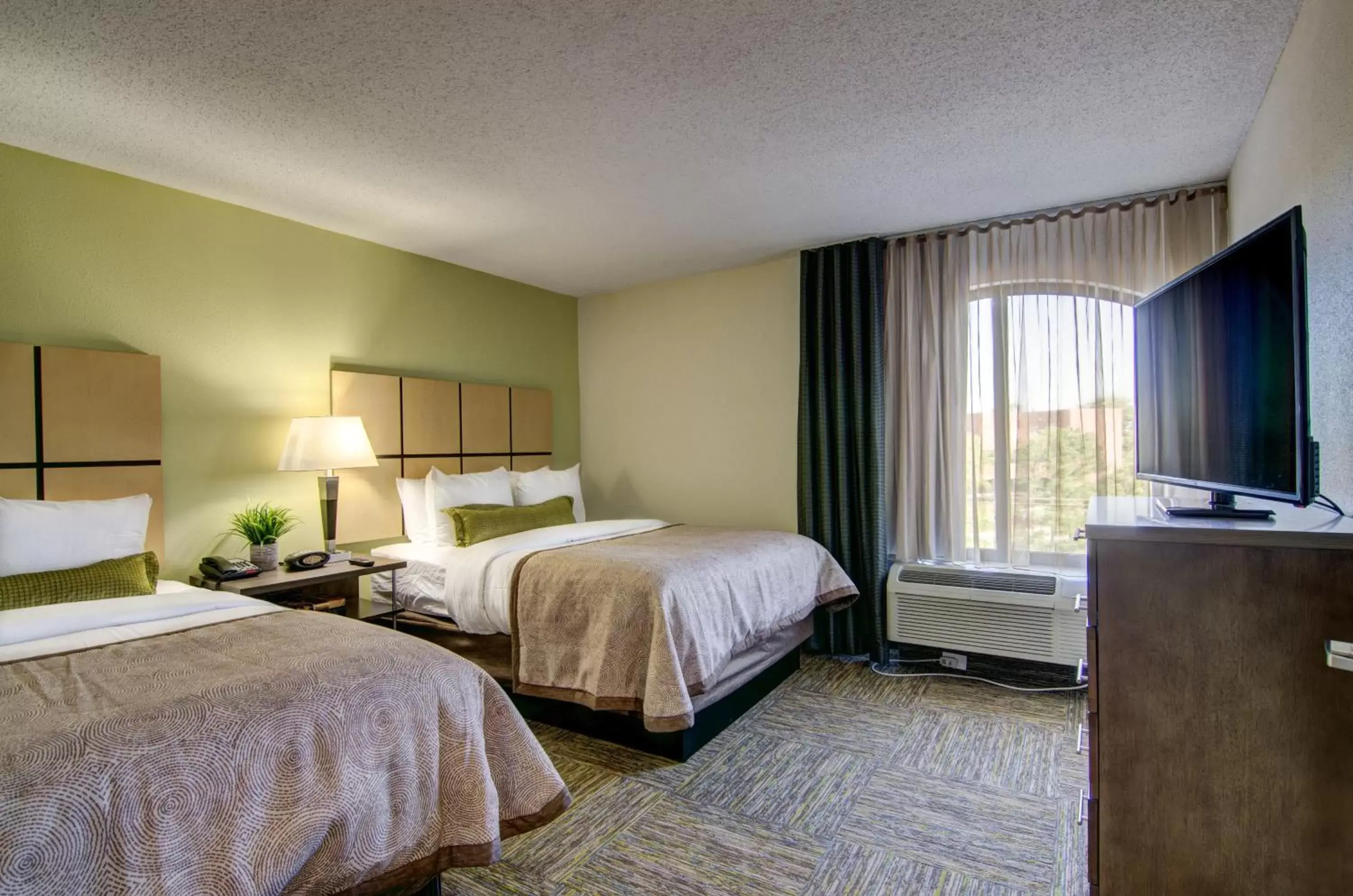 Photo of the whole room, Bed in Candlewood Suites Richmond - West Broad, an IHG Hotel