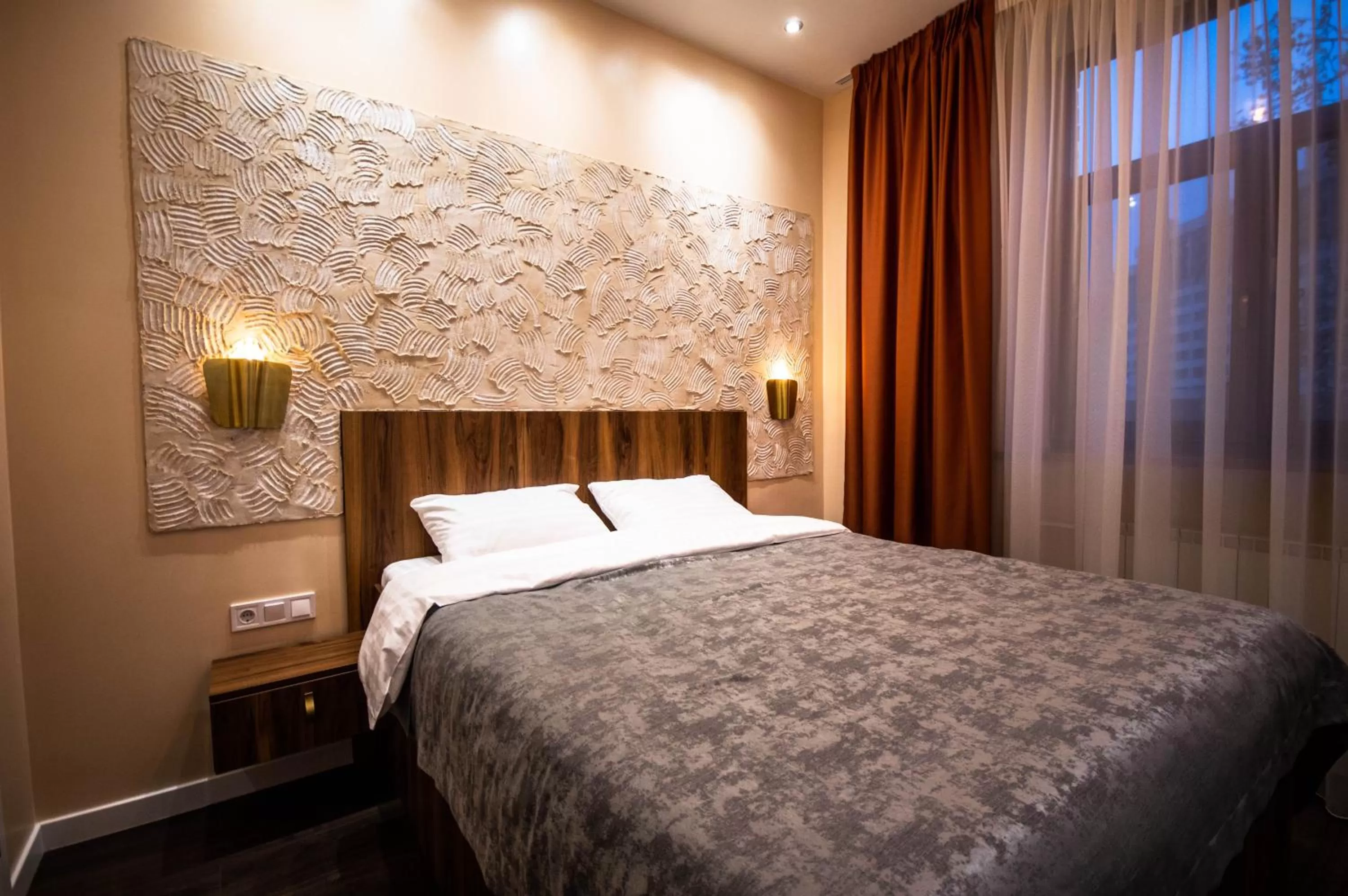 Bed in Kyiv Panorama Apartments near Gulliver