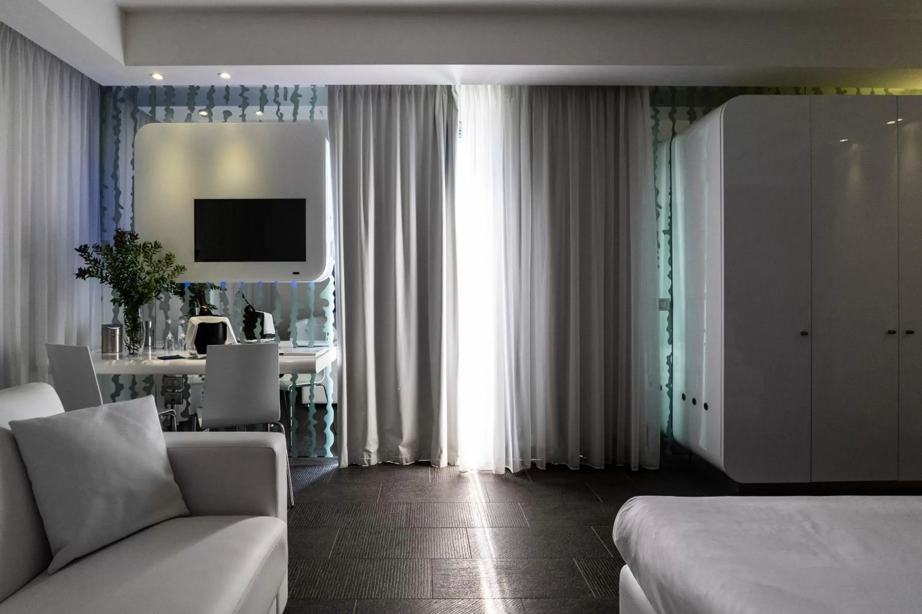 Bedroom, Seating Area in A Point Porto Ercole Resort & Spa