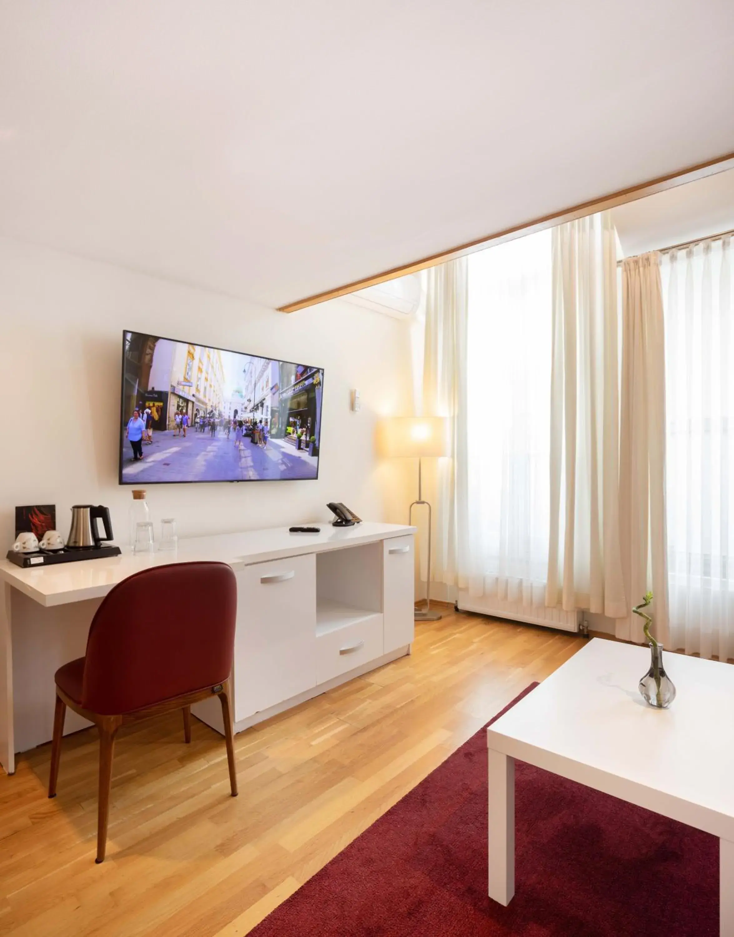 Living room, TV/Entertainment Center in The Levante Rathaus Apartments