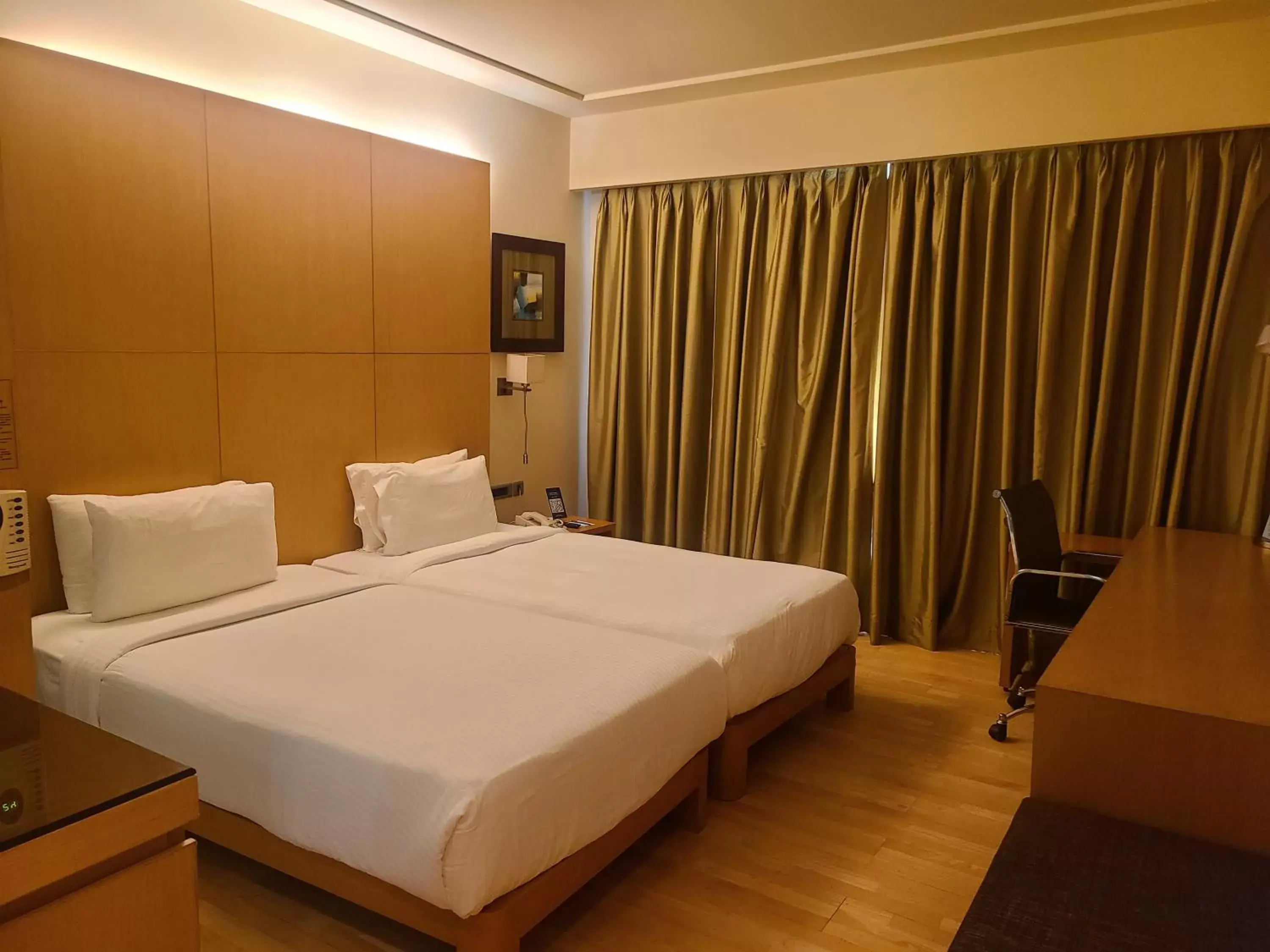Photo of the whole room, Bed in Novotel Hyderabad Airport