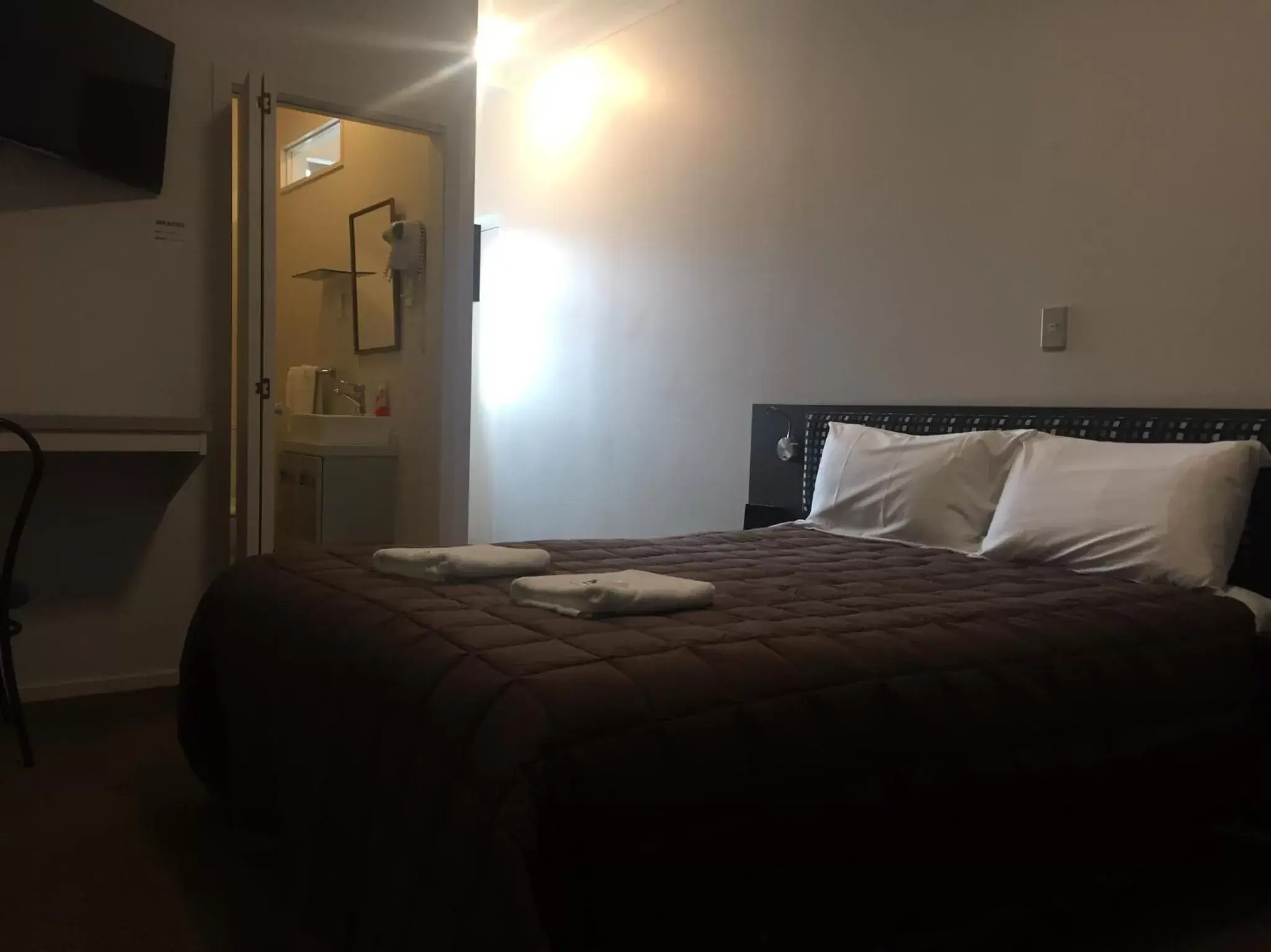 Photo of the whole room, Bed in Motel on Carroll