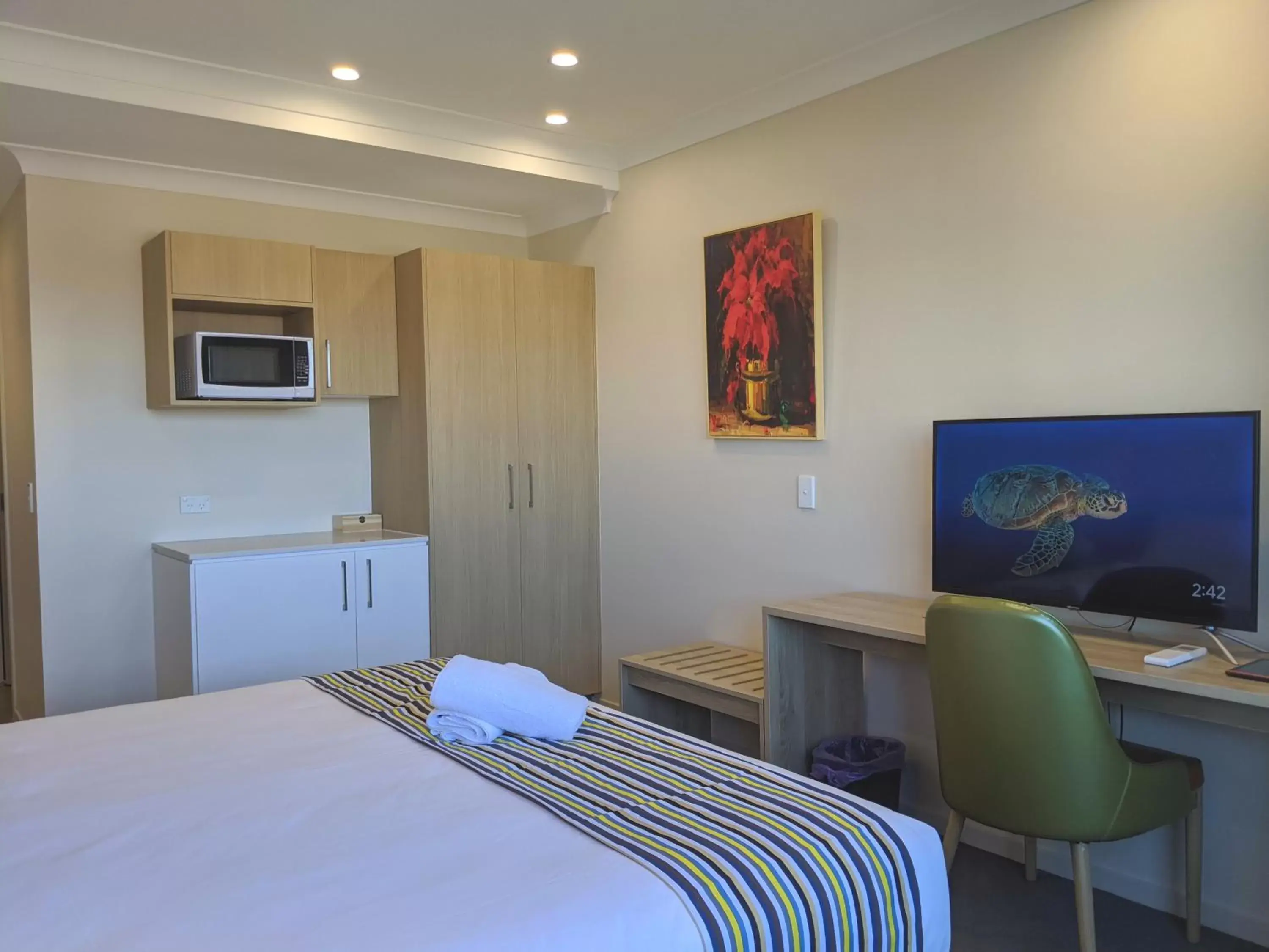 Bed in The Windsor Apartments and Hotel Rooms, Brisbane