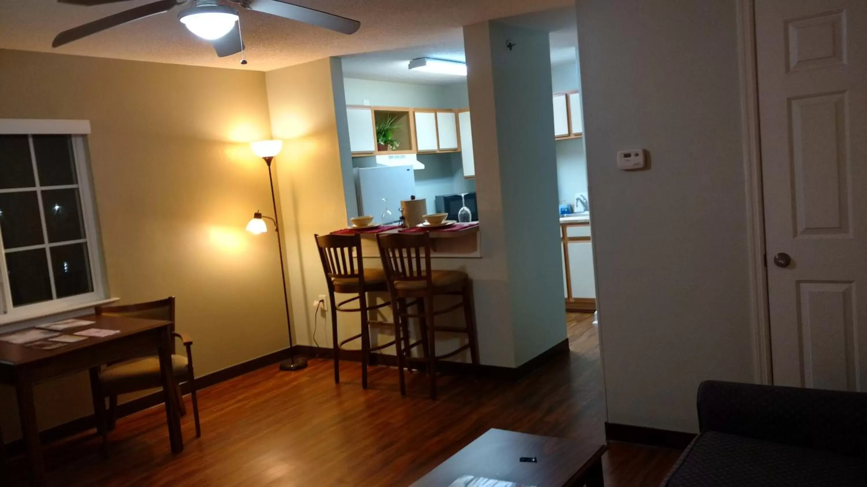Kitchen or kitchenette, Dining Area in Affordable Suites Jacksonville