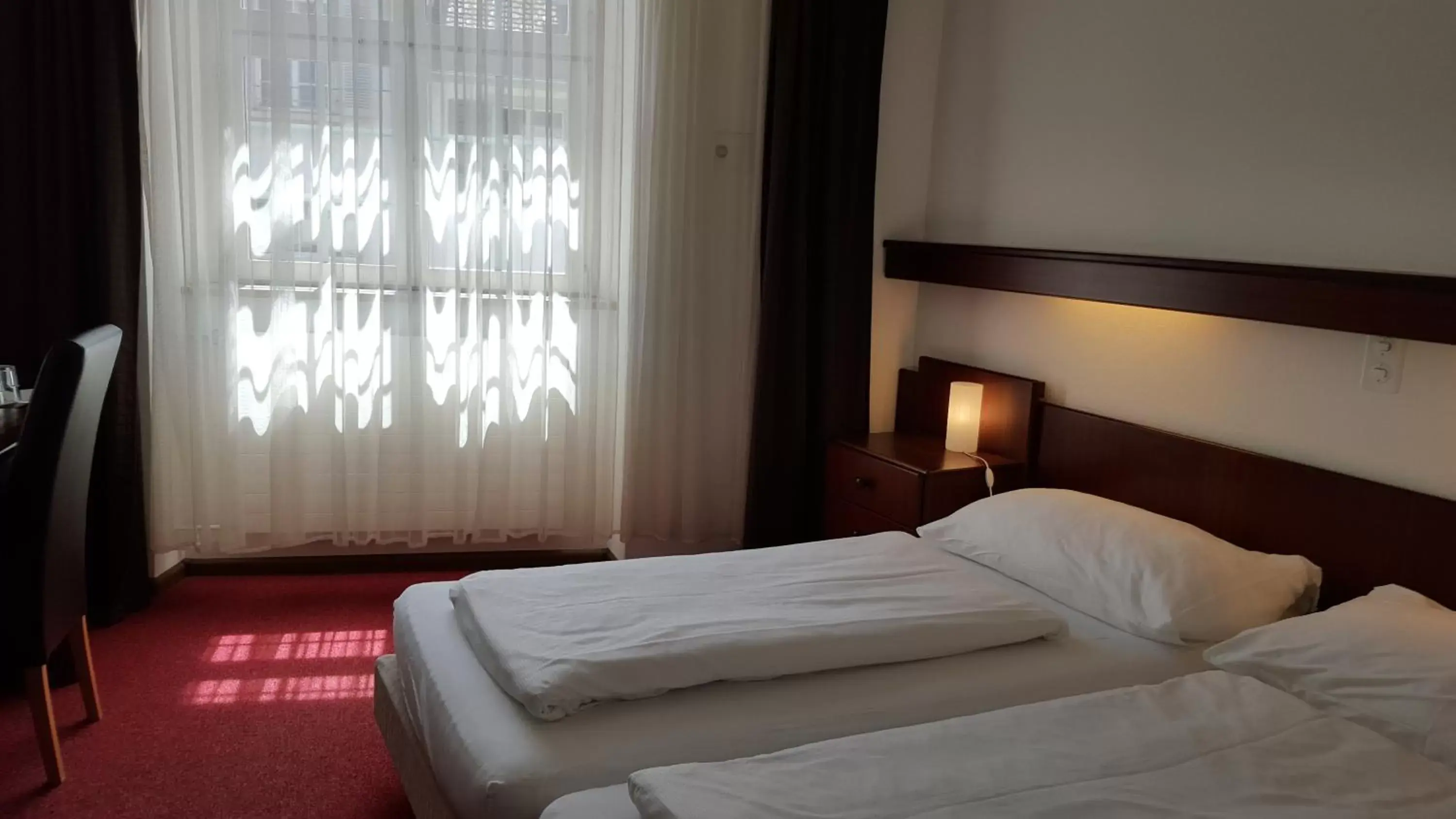 Bed, Room Photo in Spalenbrunnen Hotel & Restaurant Basel City Center
