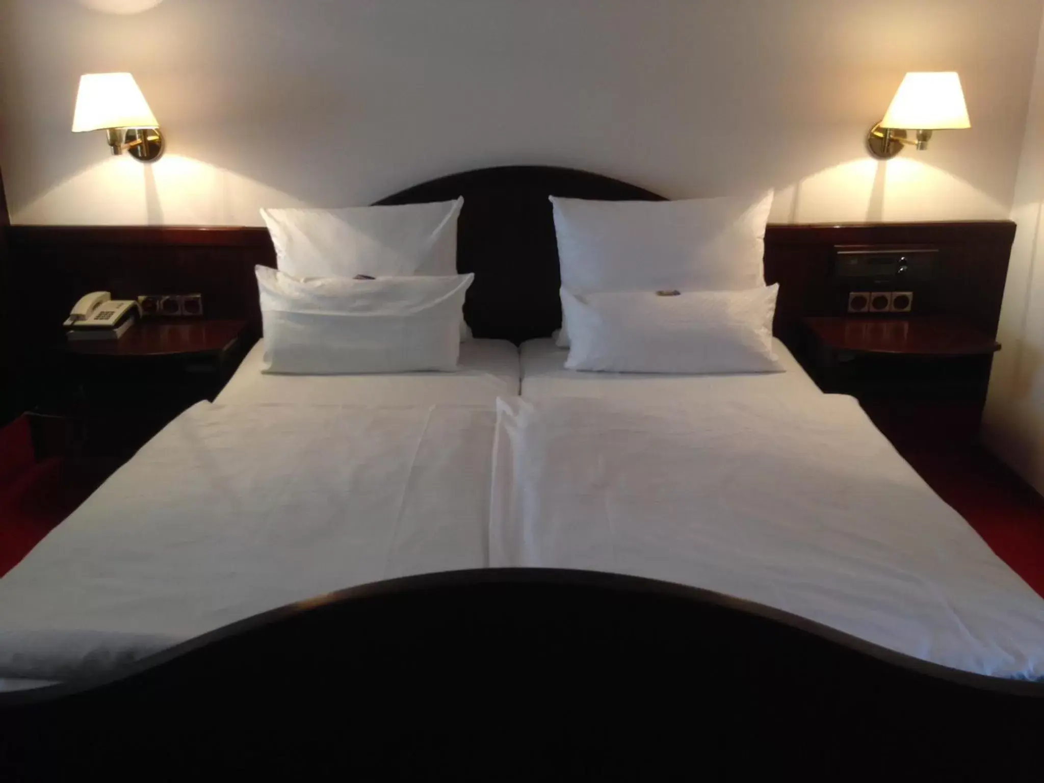Bed in Eisberg Hotel City