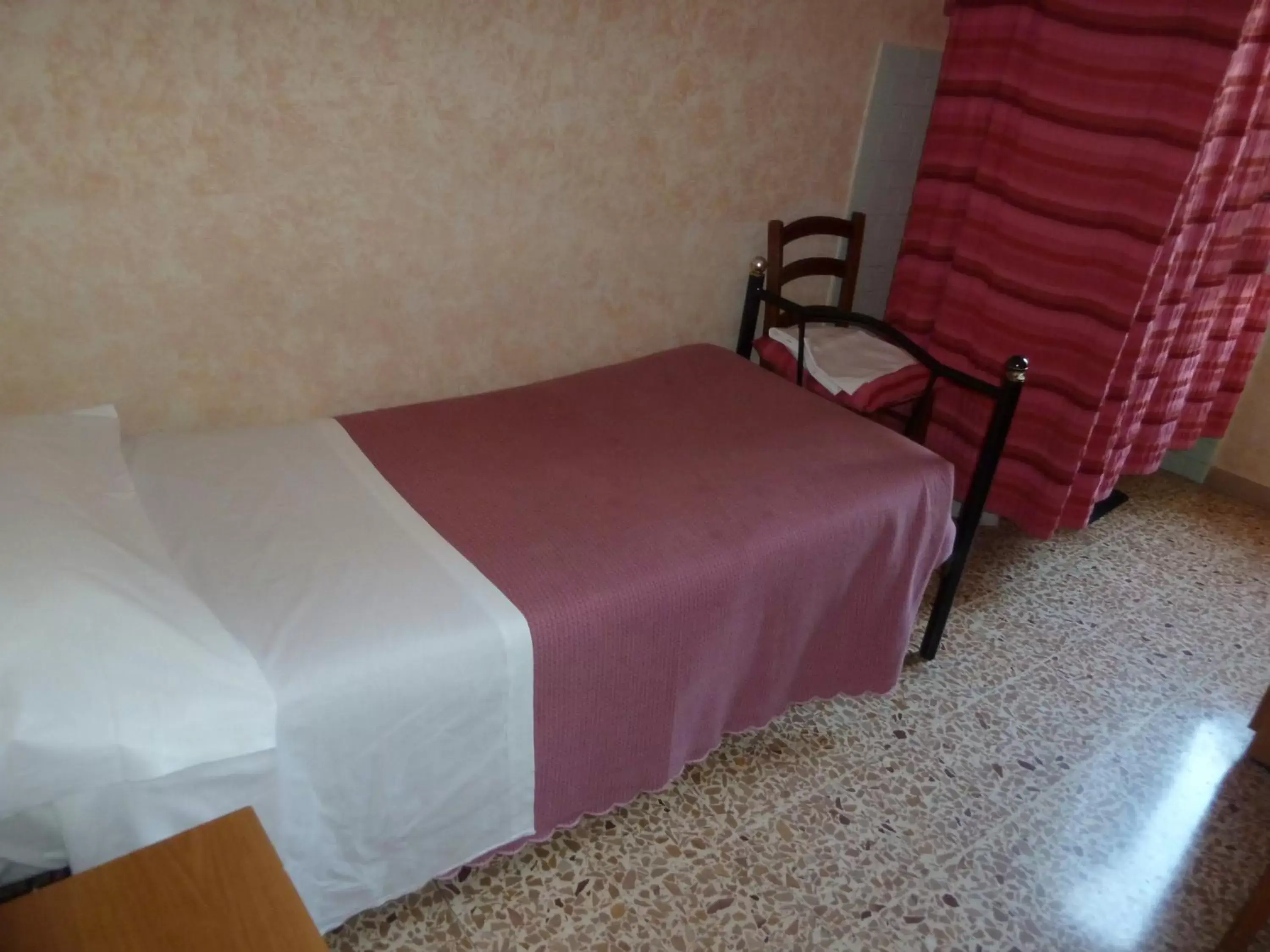 Bed in Hotel Bolognese