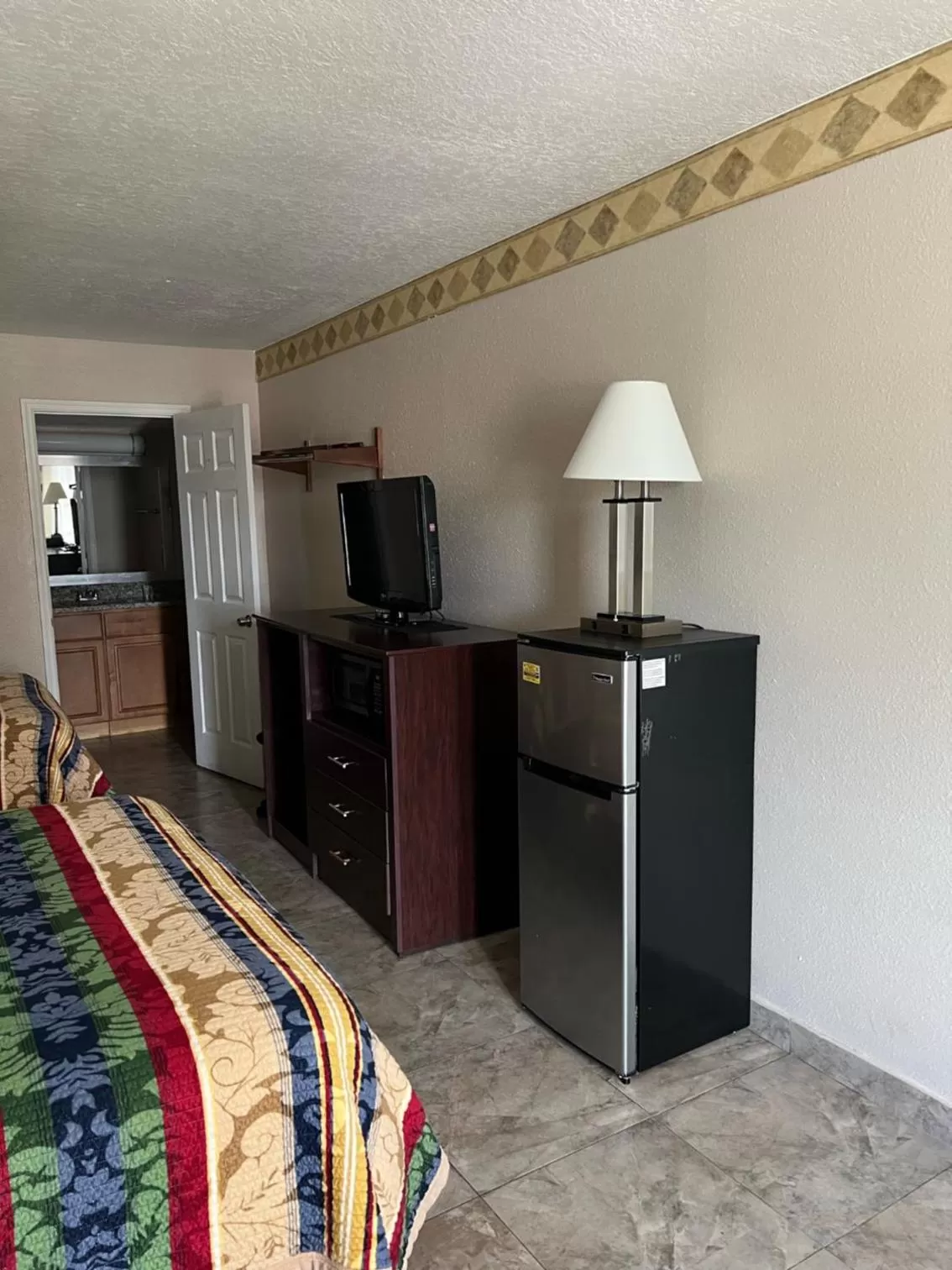 TV and multimedia, Bed in Rodeway Inn New Port Richey