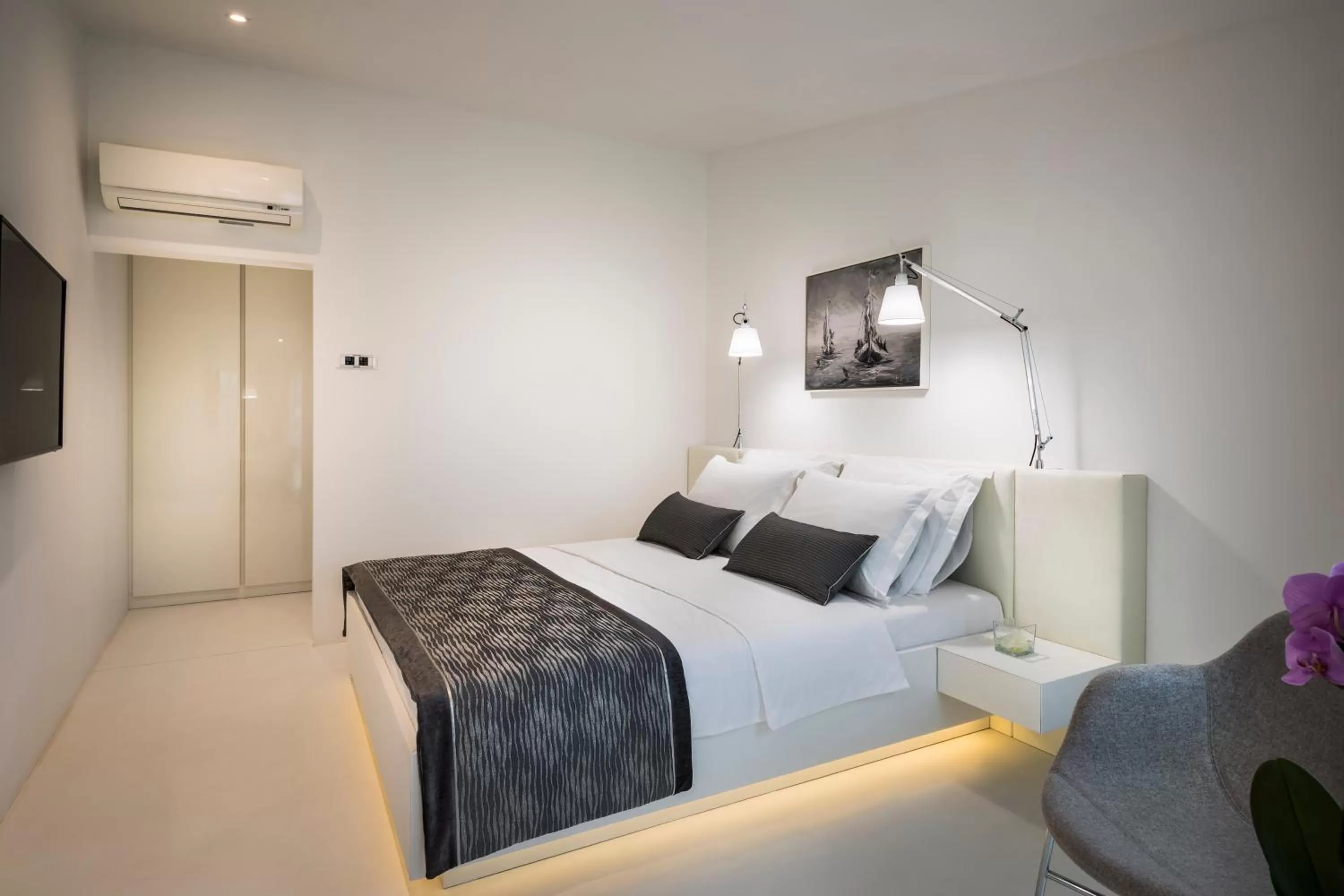 Photo of the whole room, Bed in RIVALMARE BEACH Boutique Hotel