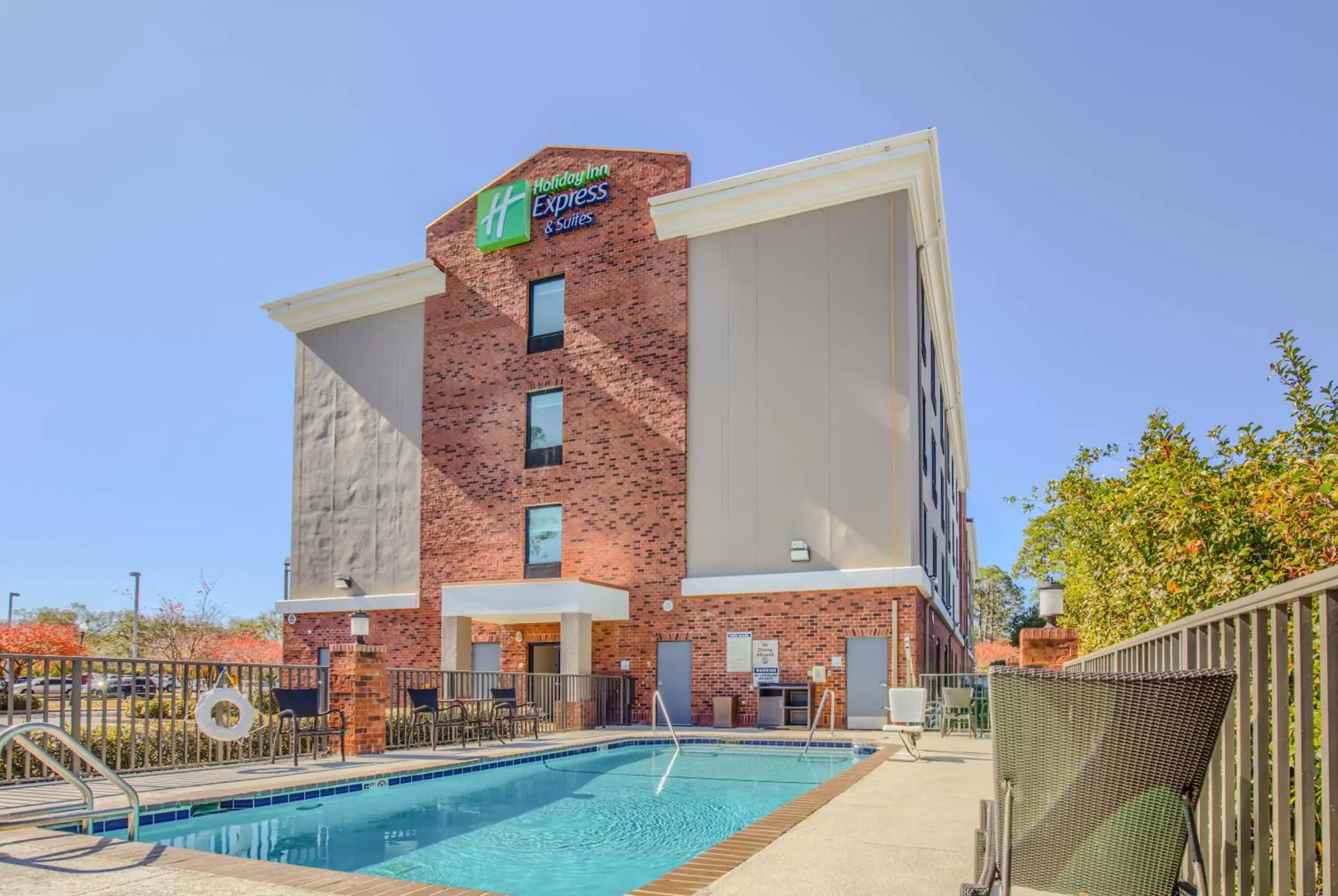 Swimming pool, Property Building in Holiday Inn Express Hotel & Suites Gulf Shores, an IHG Hotel