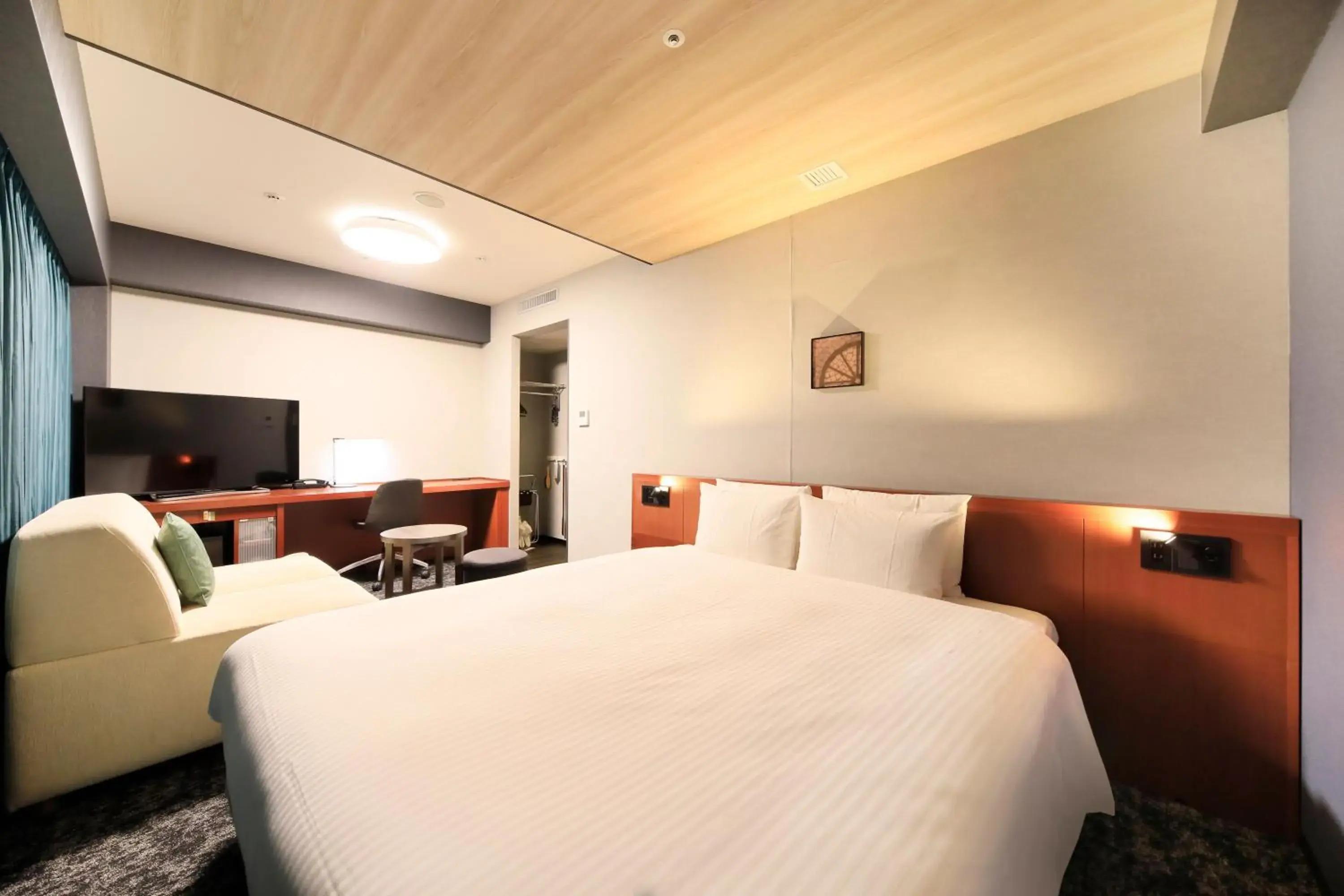 Bed in Richmond Hotel Yokohama Bashamichi