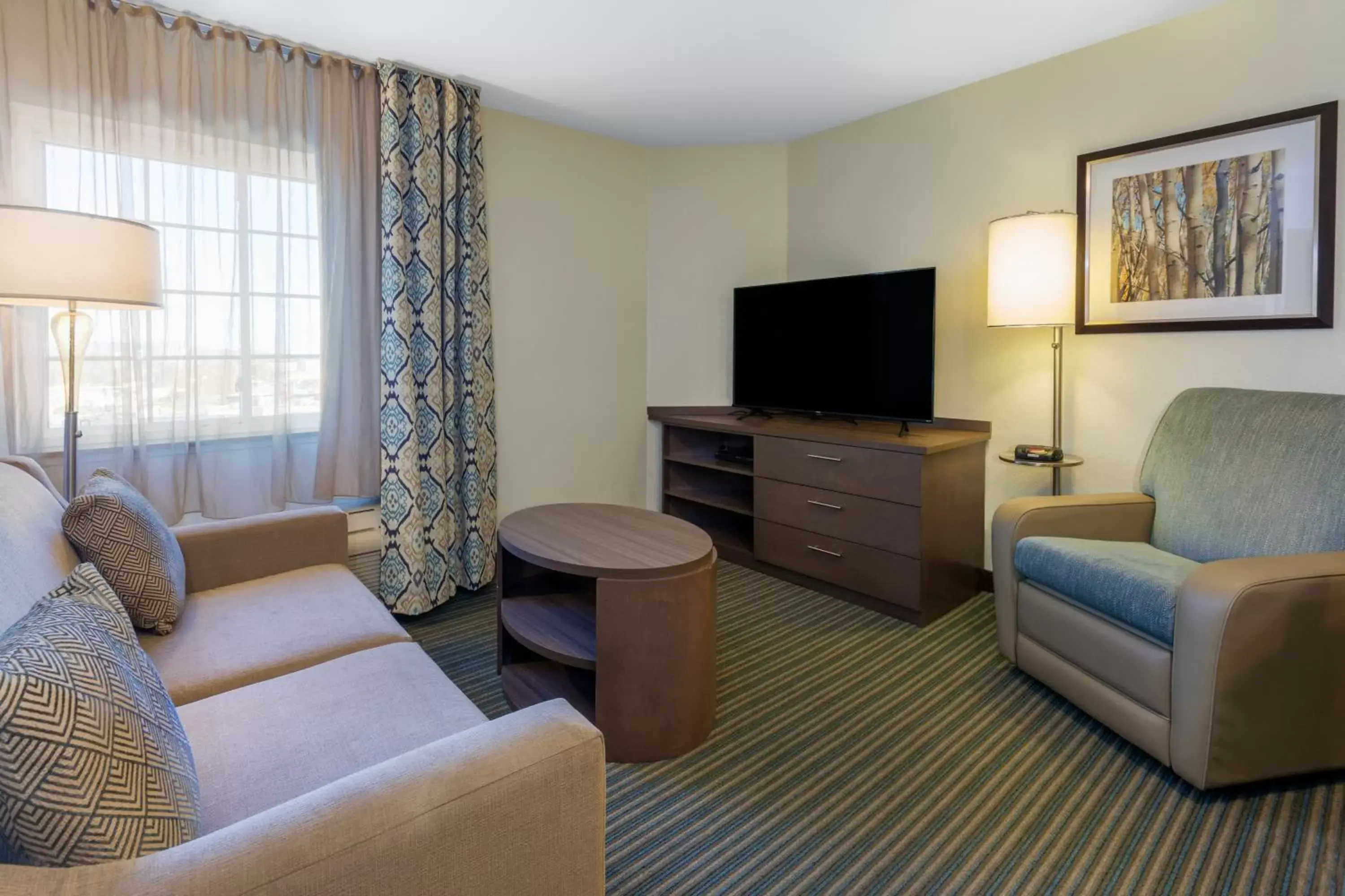 Seating Area in Candlewood Suites-West Springfield, an IHG Hotel