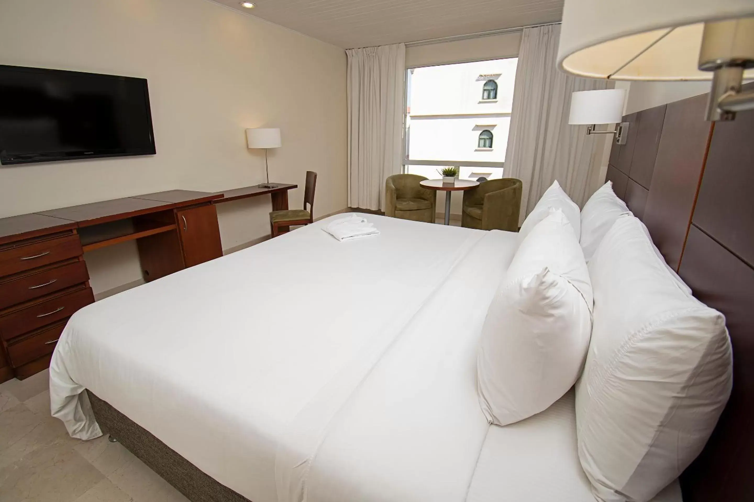 Bed in Hotel Caribe by Faranda Grand, a member of Radisson Individuals