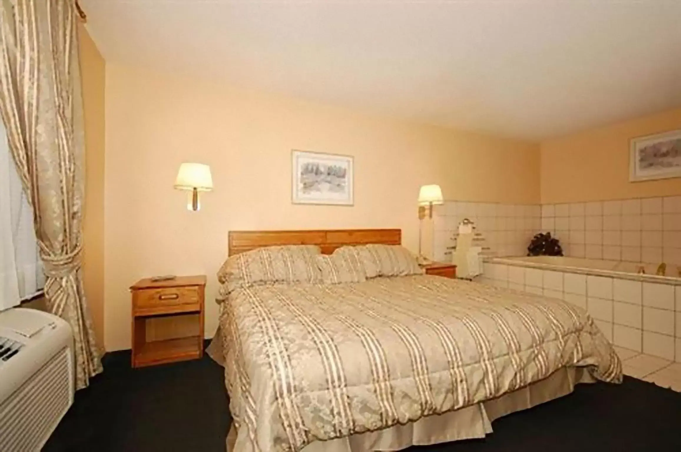 Bed in Americas Best Value Inn Webster City Bed in Americas Best Value Inn Webster City