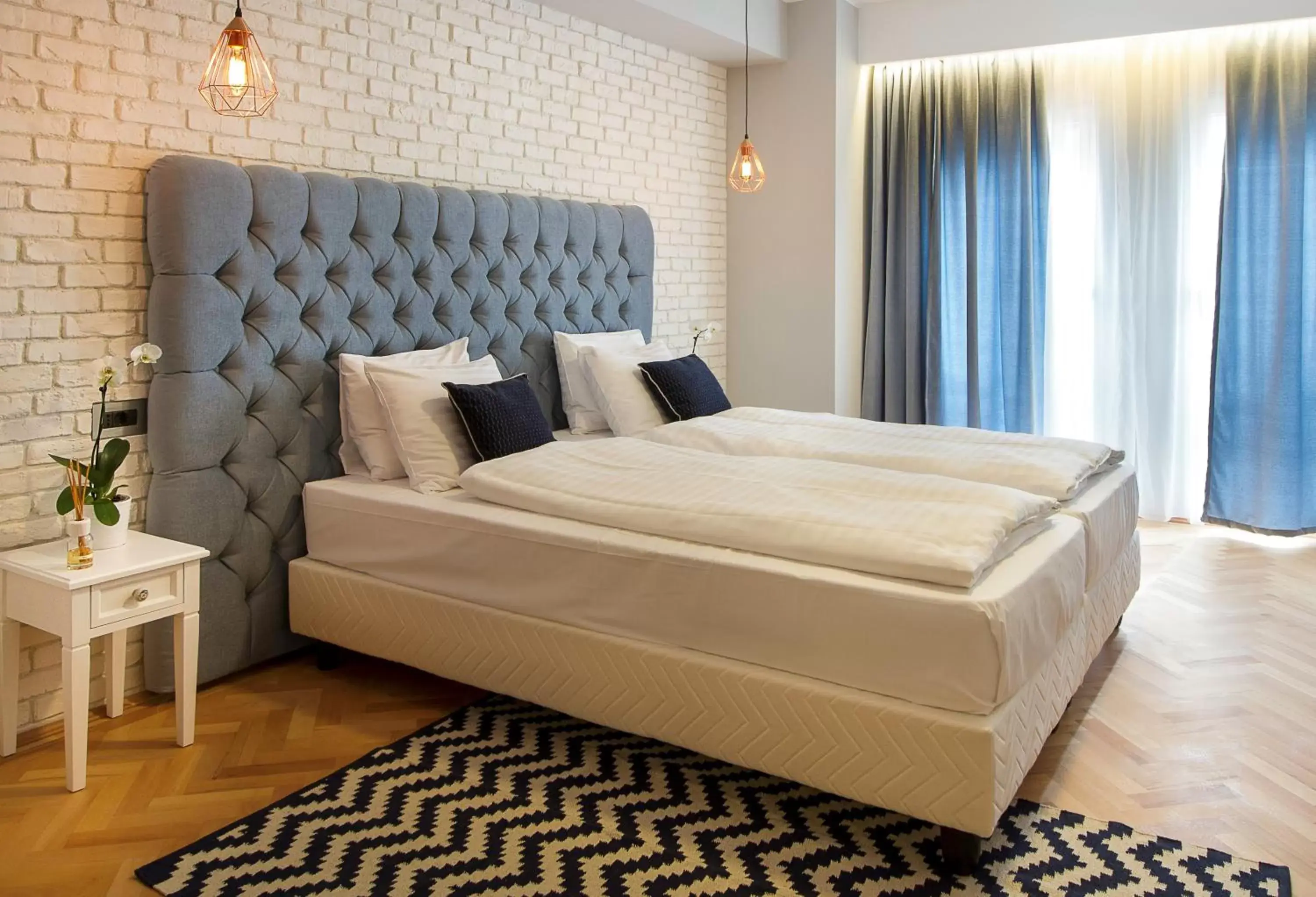 Bed in Venis Boutique Hotel